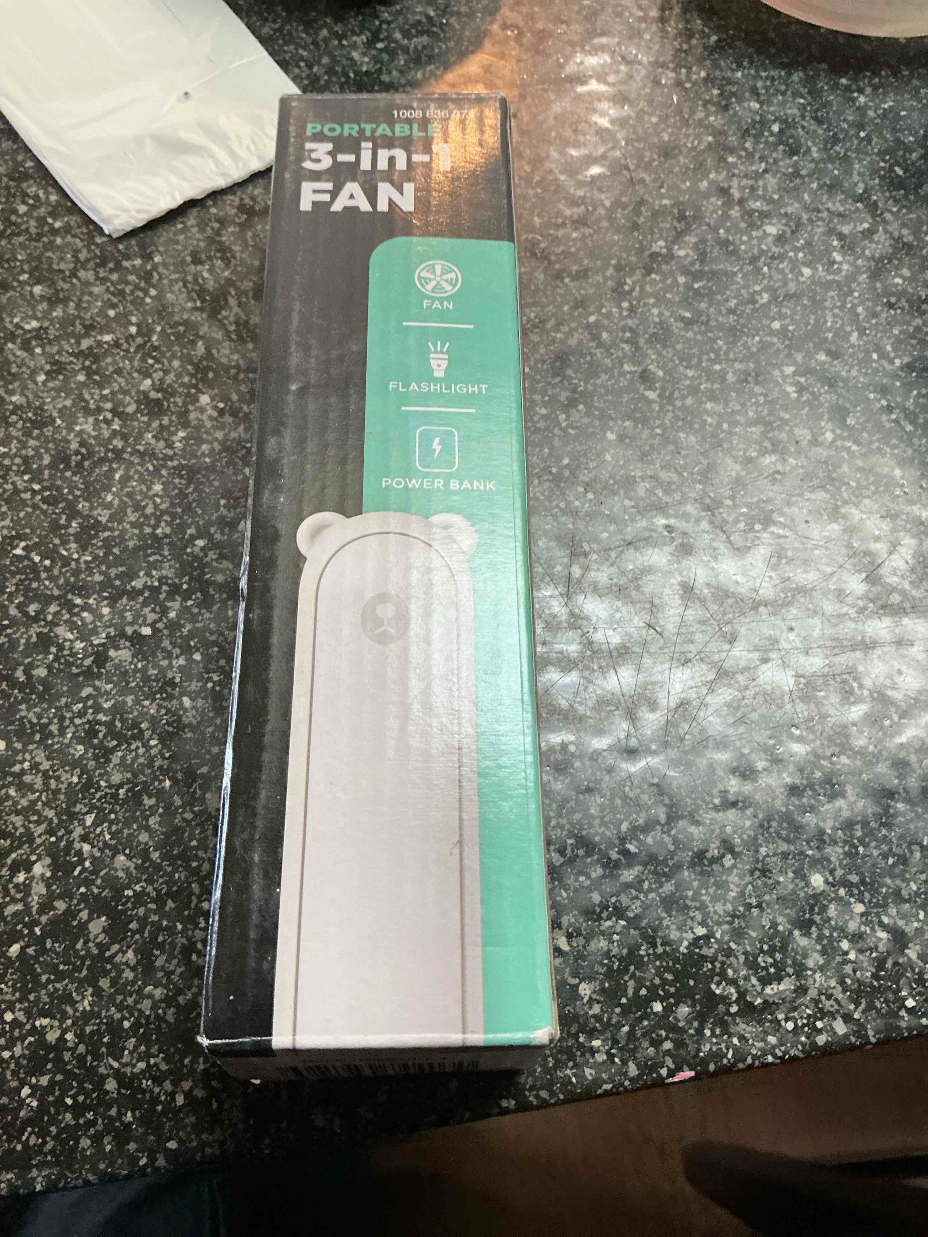 3-in-1 fan white in color has a power bank flashlight 