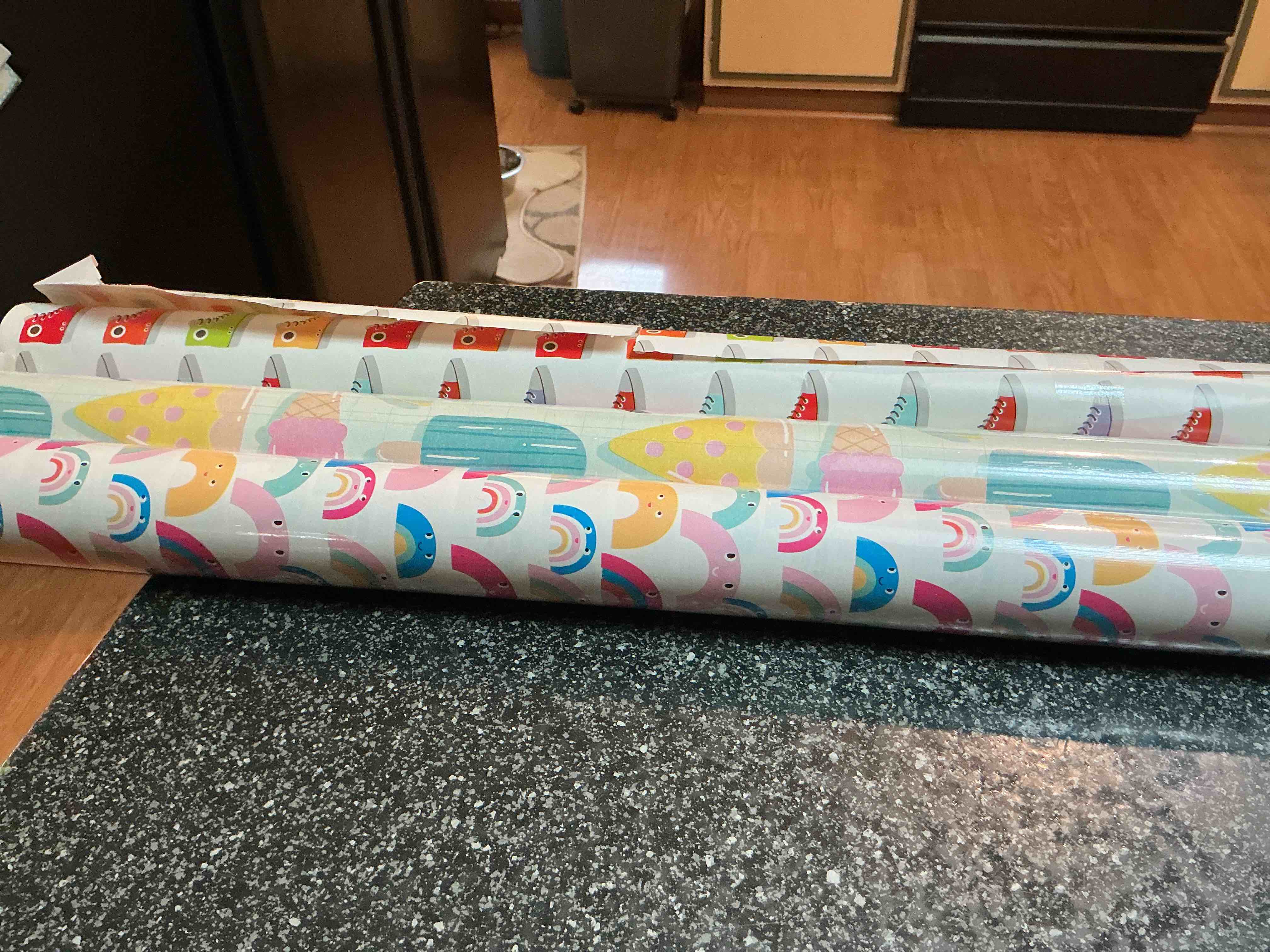 3 Rolls Of Wraping Paper