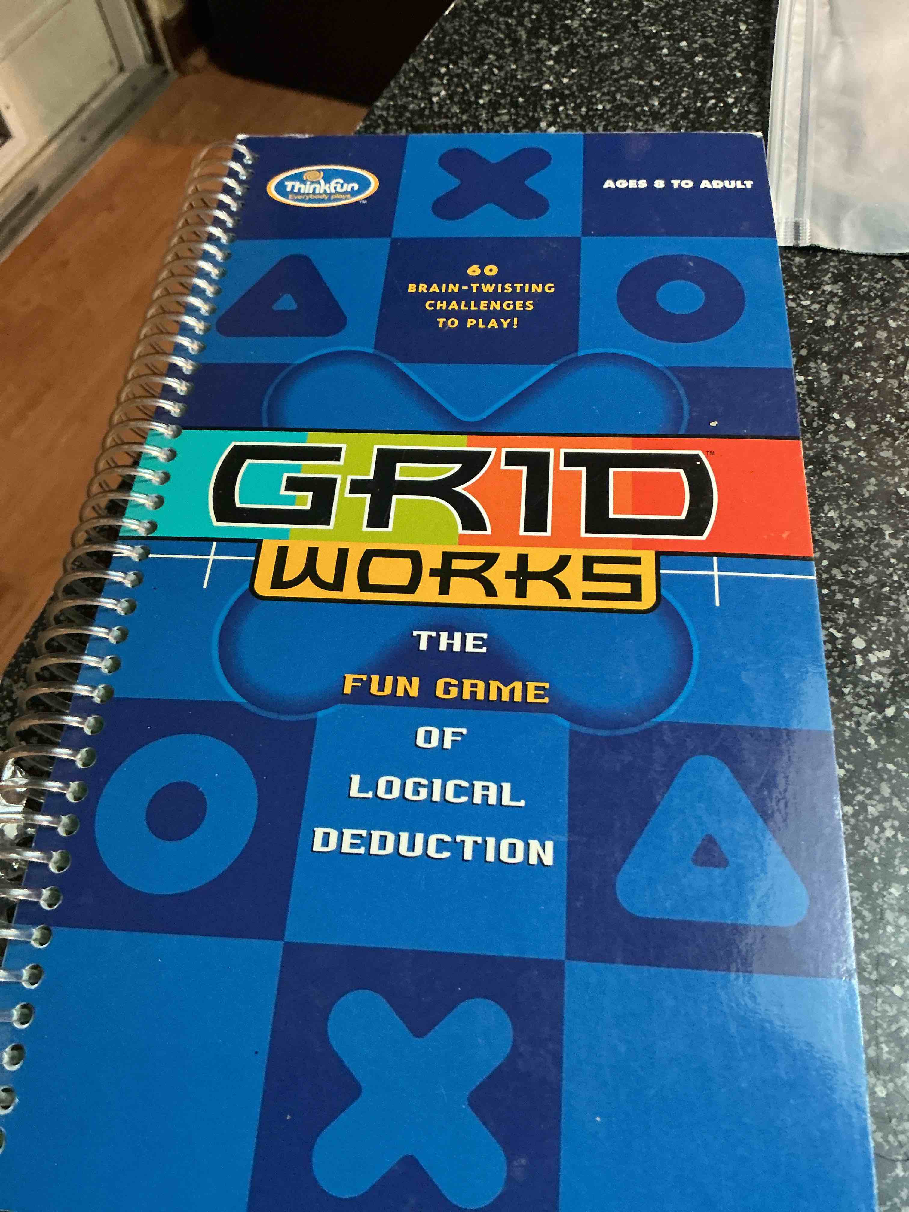 Condition photo showing New/Like New for Think Fun Grid Works The Fun Game 