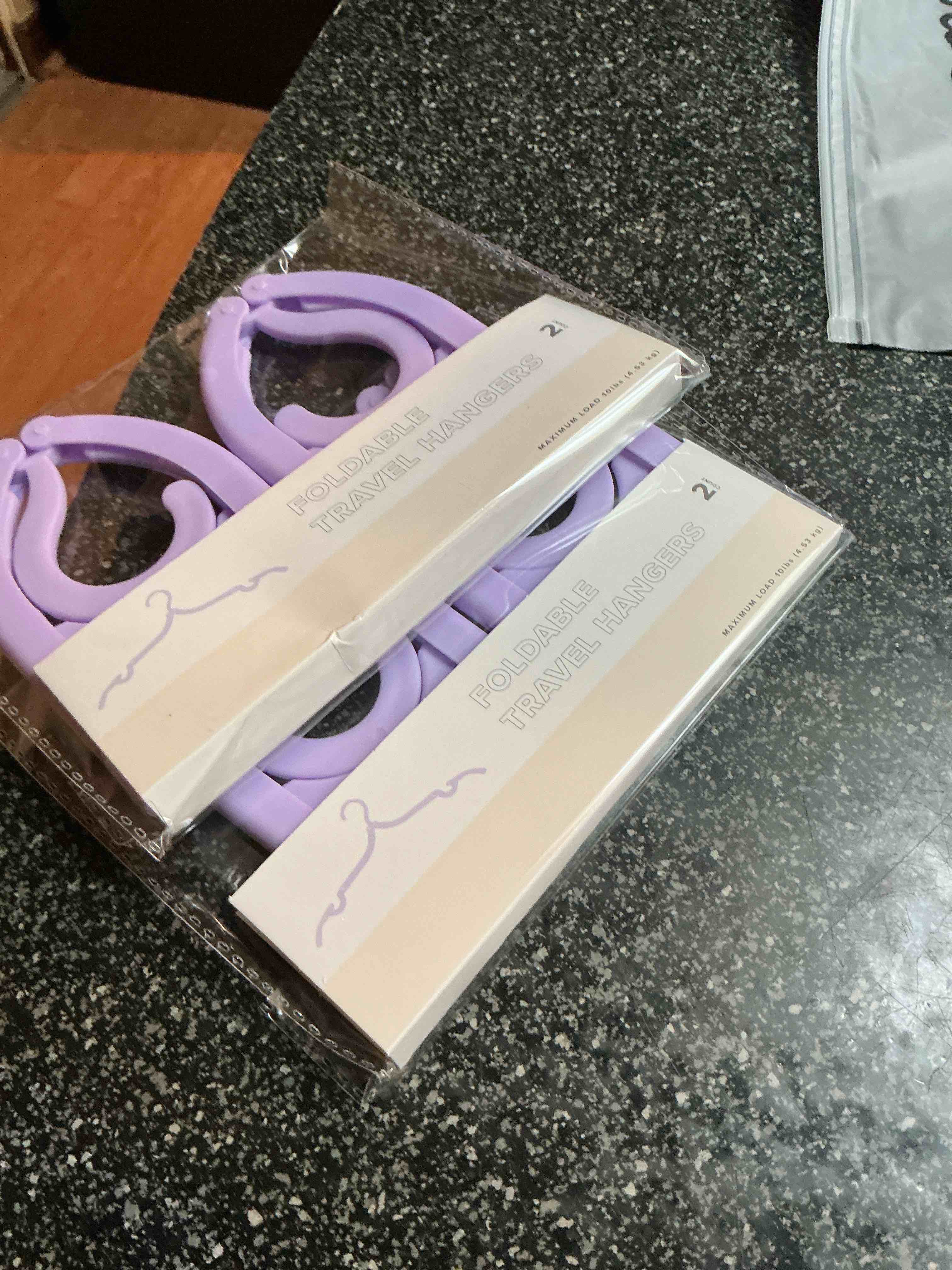 Condition photo showing New/Like New for Foldable Purple Travel Hangers 