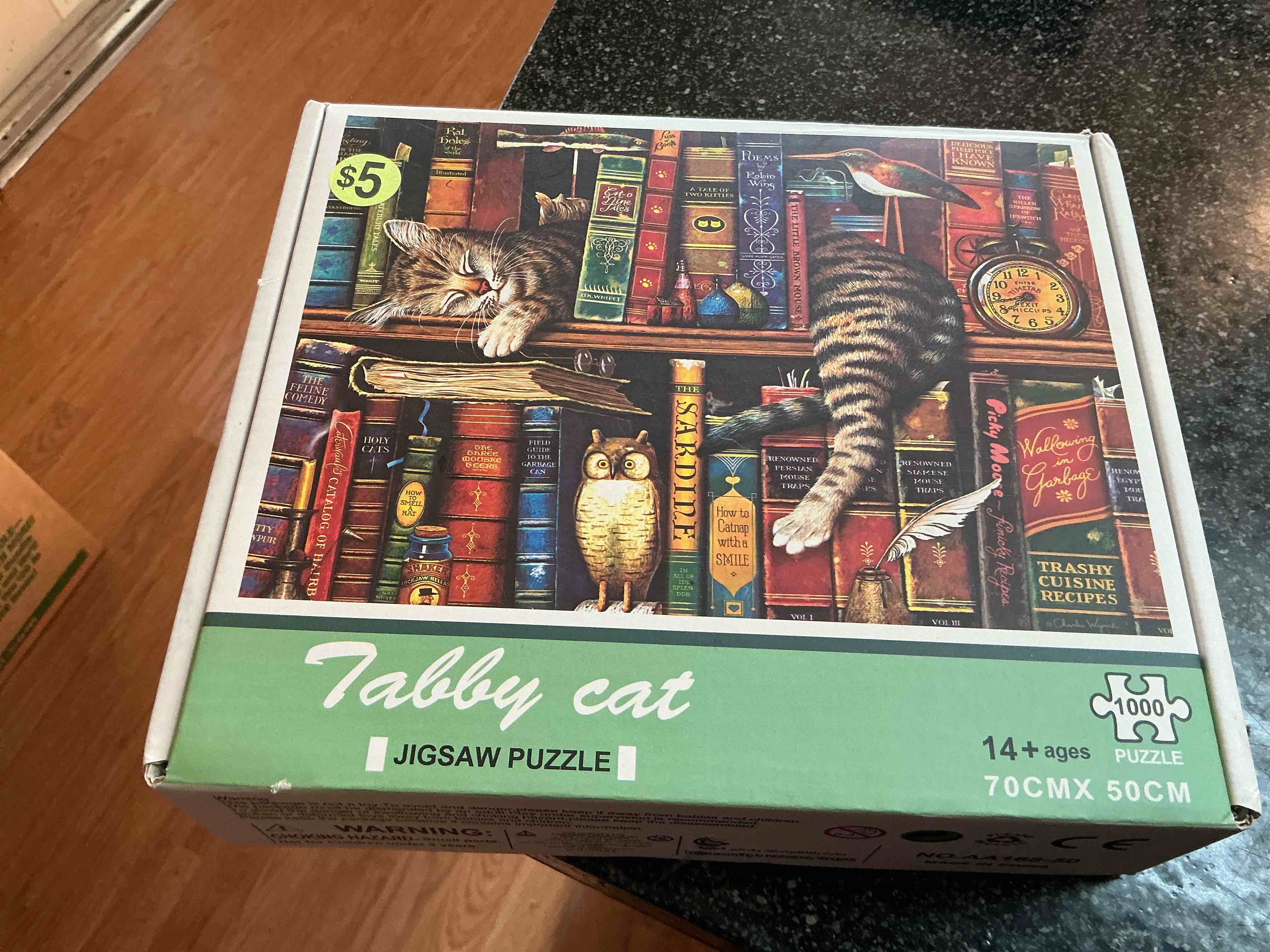 Condition photo showing New/Like New for Tally Cat 1000 Pc. Puzzle 