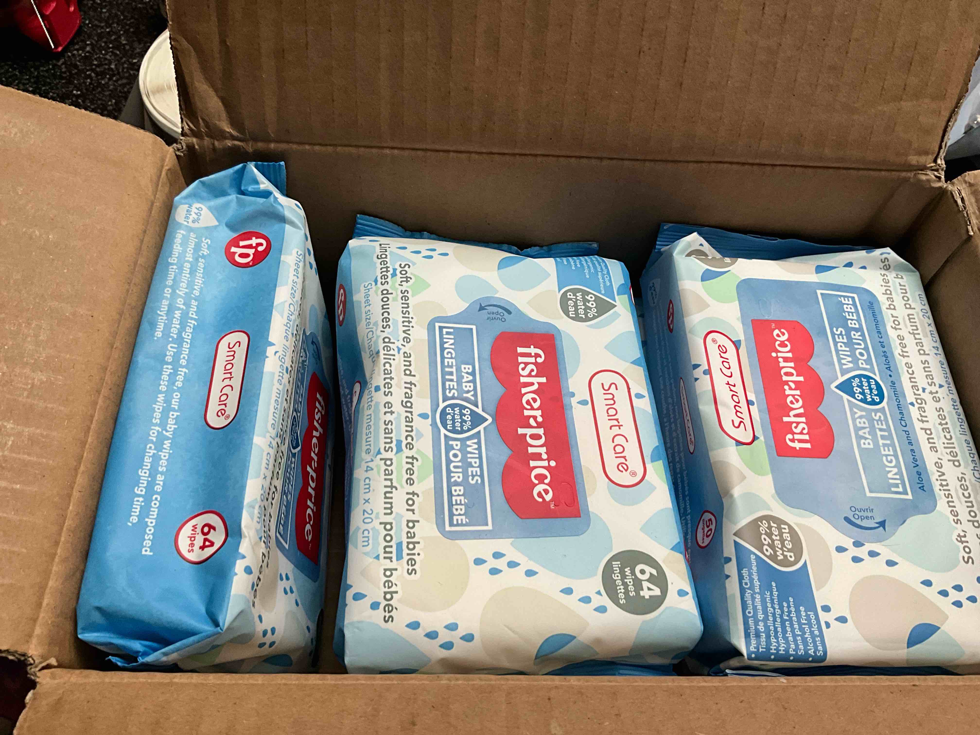 Condition photo showing As Is for LOT - Smart Care - Fisher Price - 64 count pack Wipes  