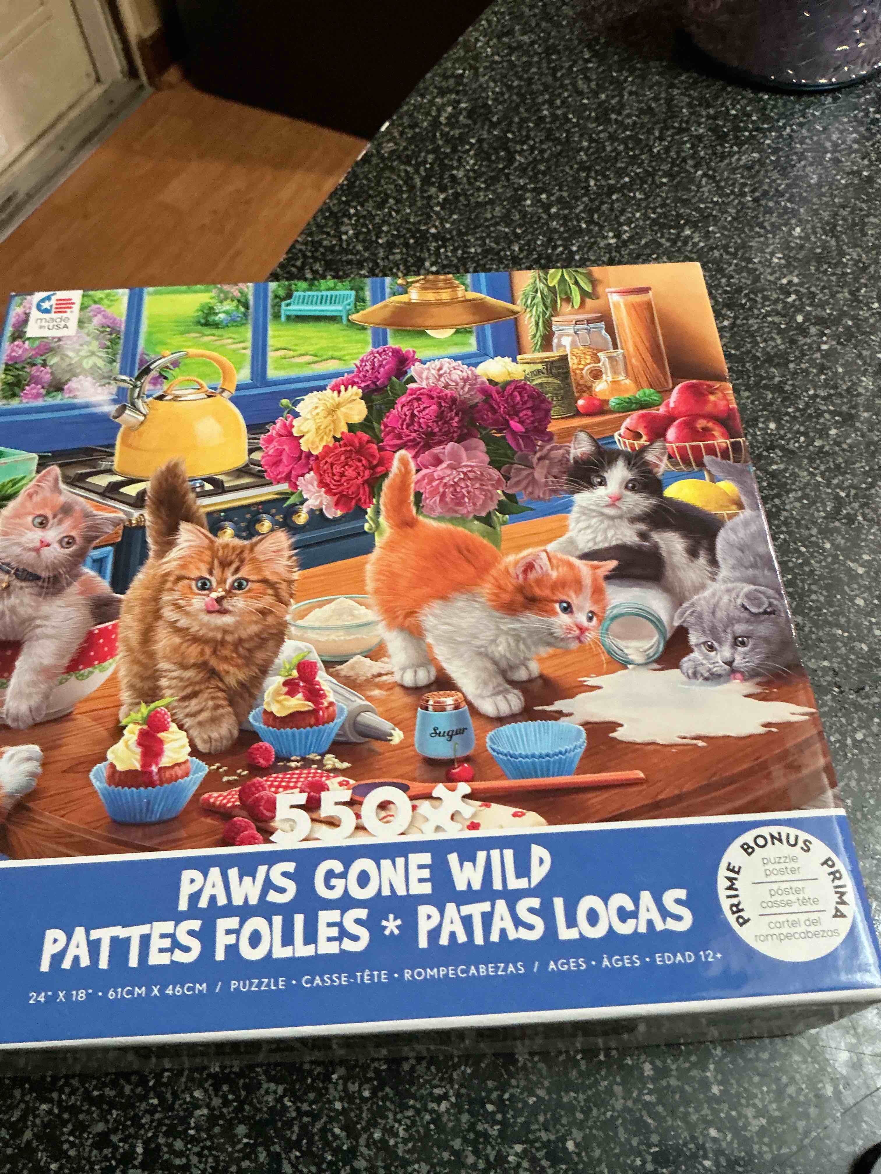 Condition photo showing New/Like New for Paws Gone Wild Patttes Follles 550 Pieces Puzzle 