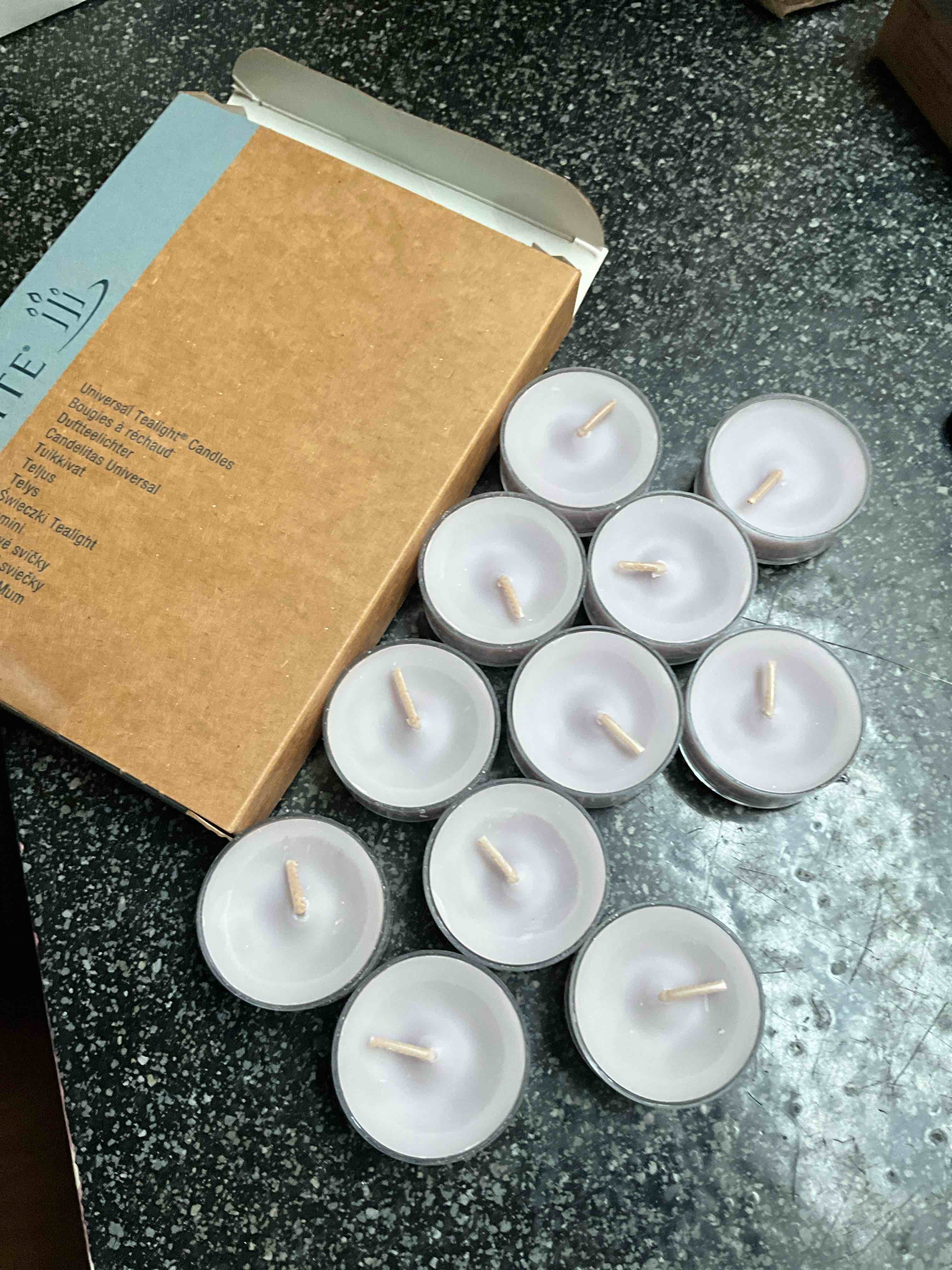 Condition photo showing New/Like New for Party Lite - Violet - Tea Light Candles - 11 count 