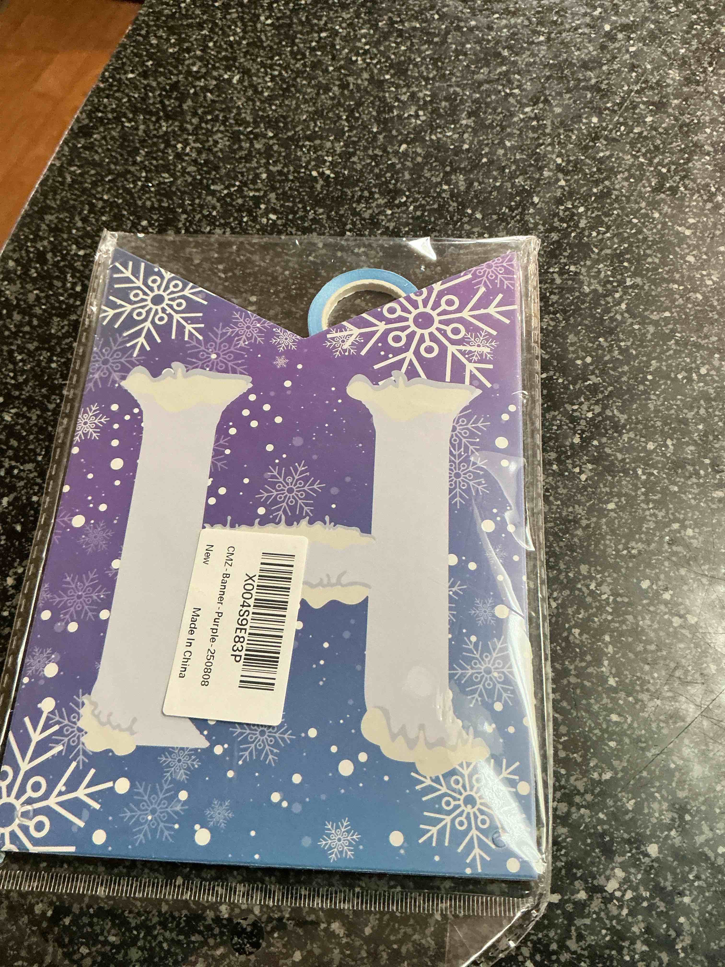 Condition photo showing New/Like New for Snow Flake Purple Banner  Letter H 