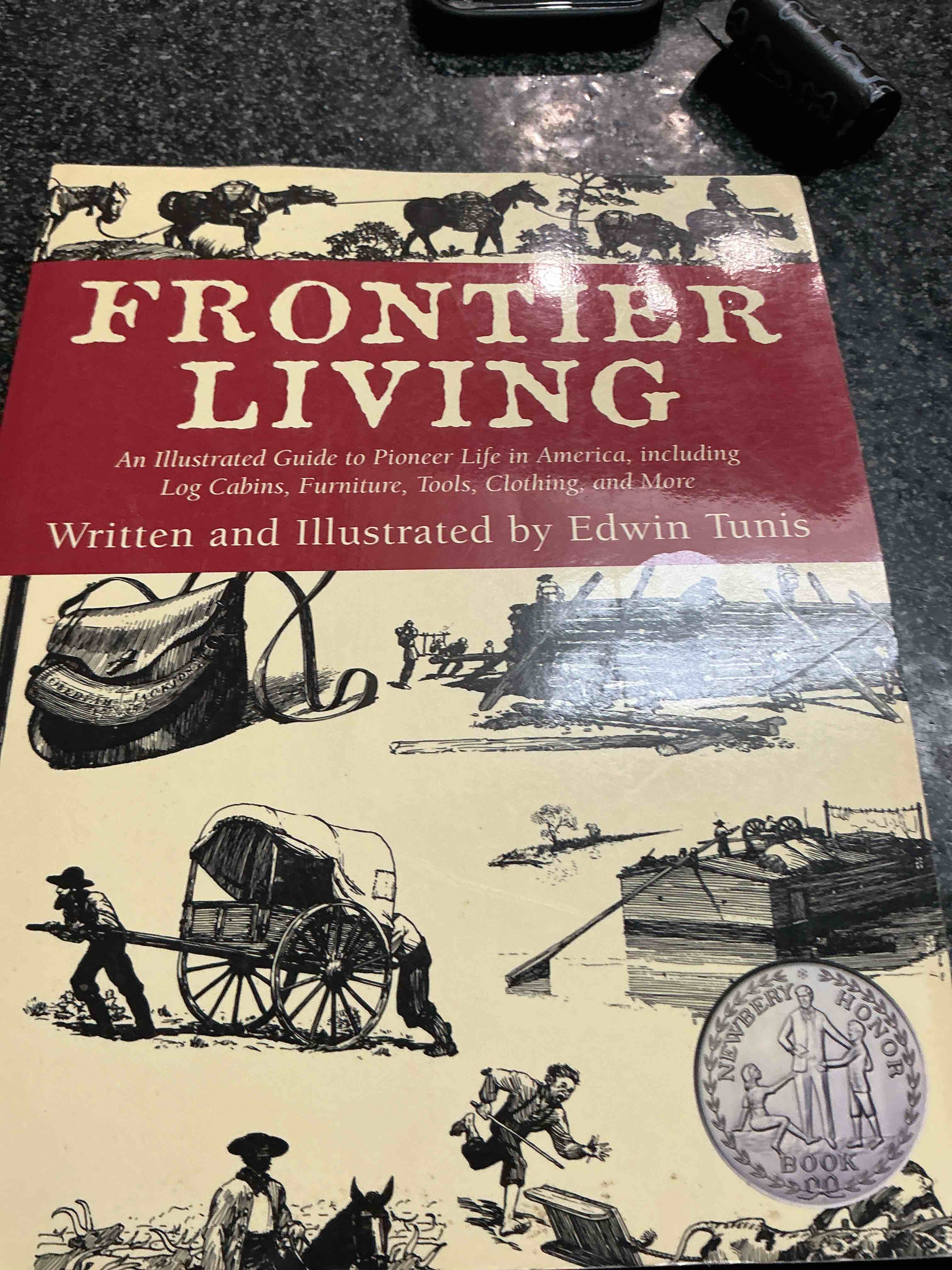 Condition photo showing New/Like New for Frontier Living Written & Illustrated By Edwin Tunis