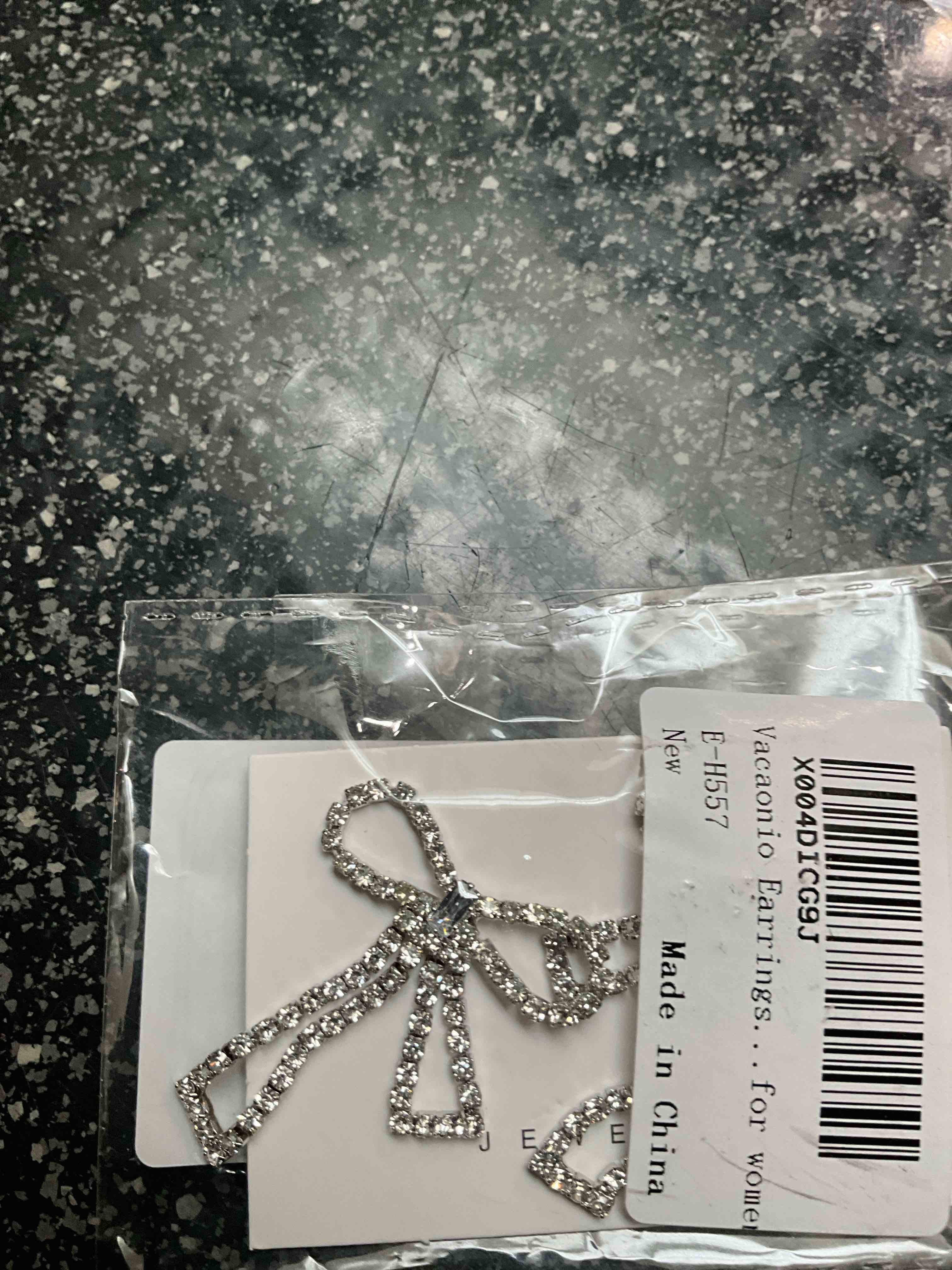 Condition photo showing New/Like New for Vacaoni - Sapphire - Bow - Earrings 