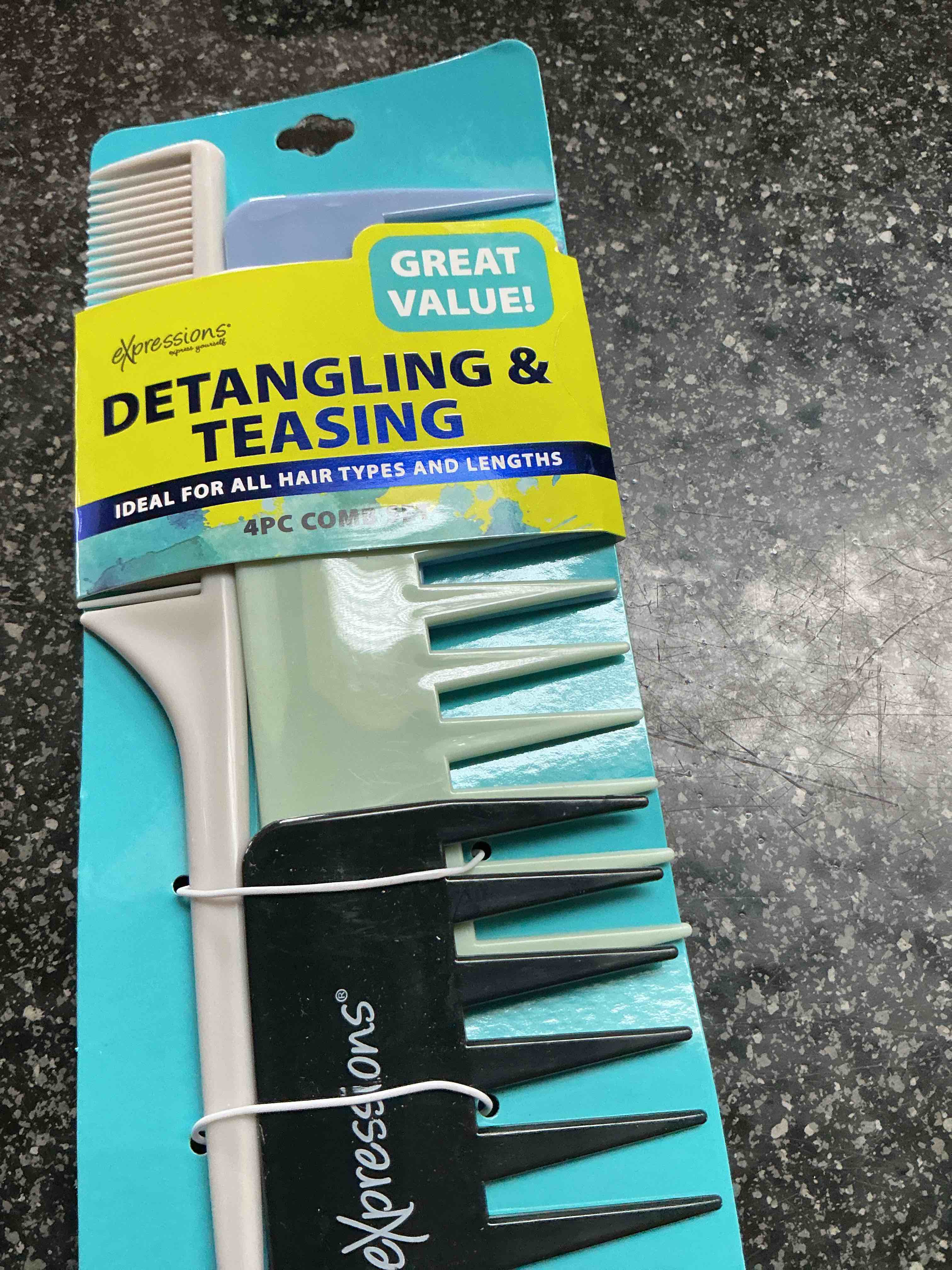 Condition photo showing New/Like New for Expression Detangling & Teasing  4 PC. Comb Set 