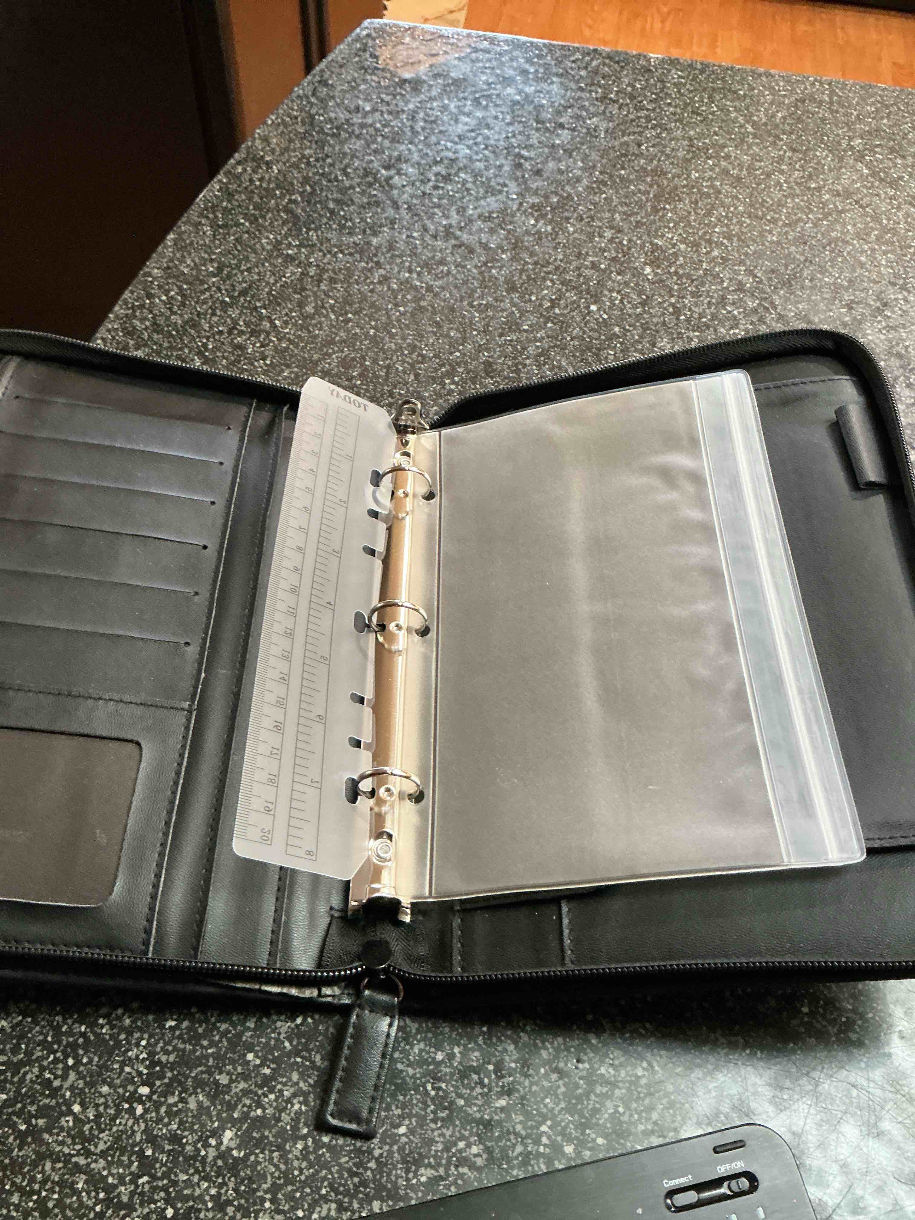 Condition photo showing New/Like New for Black Leather Yearly Planner  Organizer