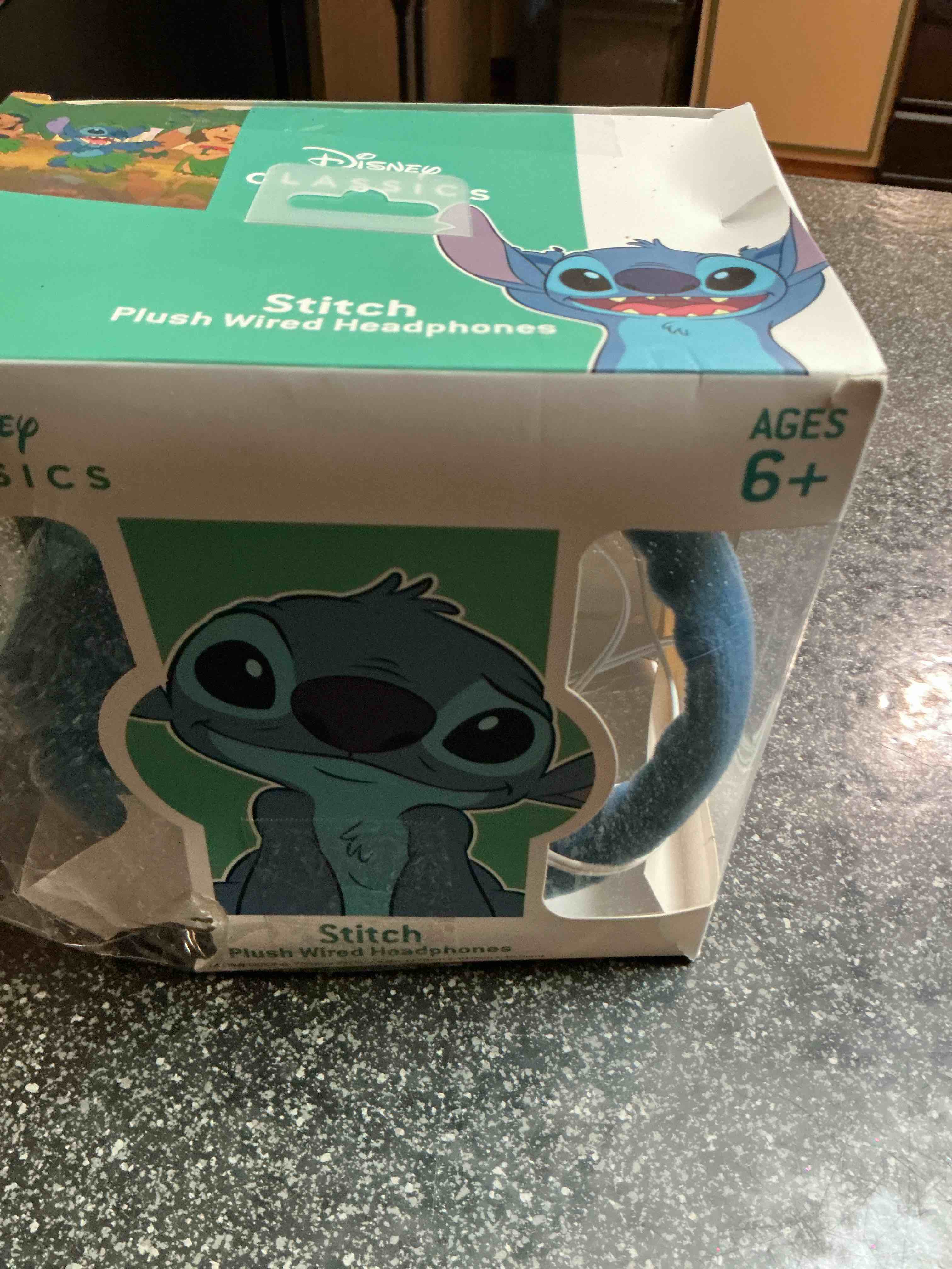 Condition photo showing New/Like New for Disney Classic Stitch Plush Wired Headphones 