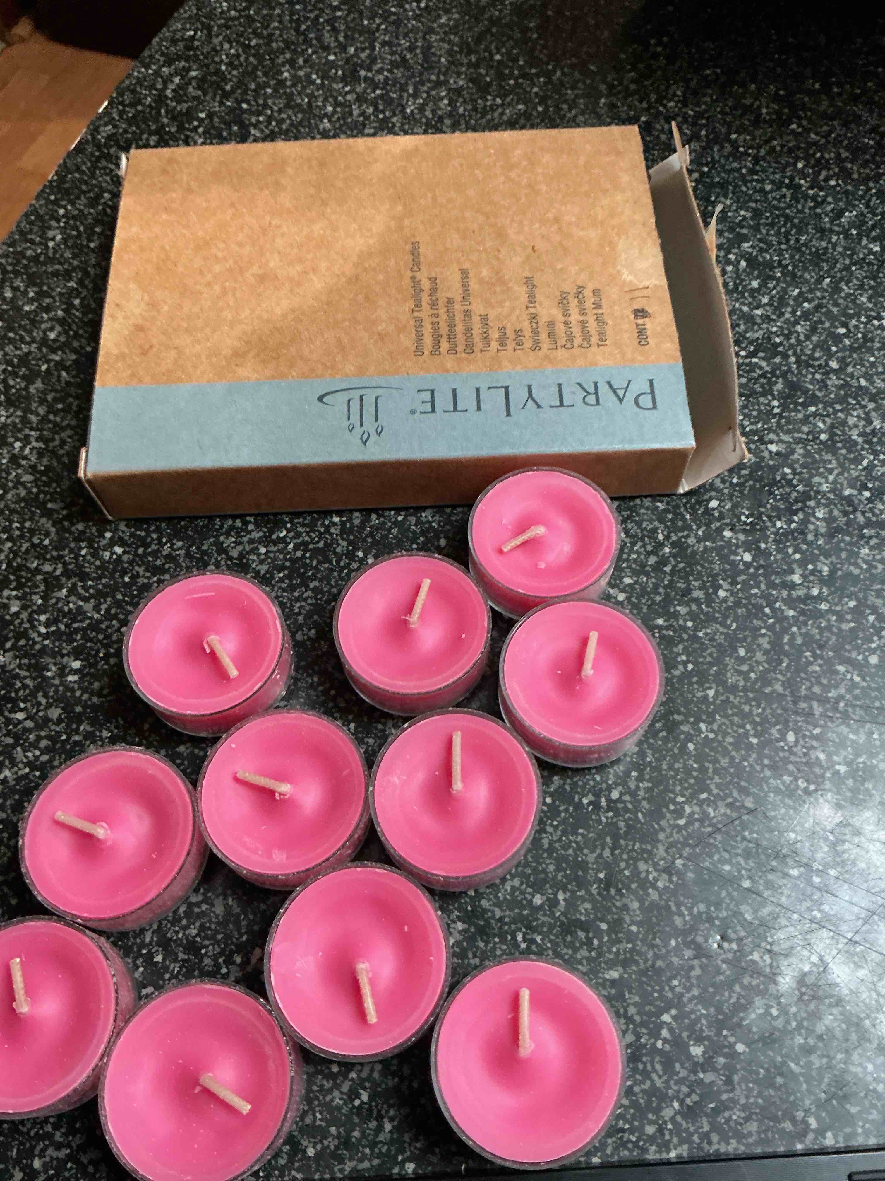 Condition photo showing New/Like New for Partylite Red Tea Lights 11 Count