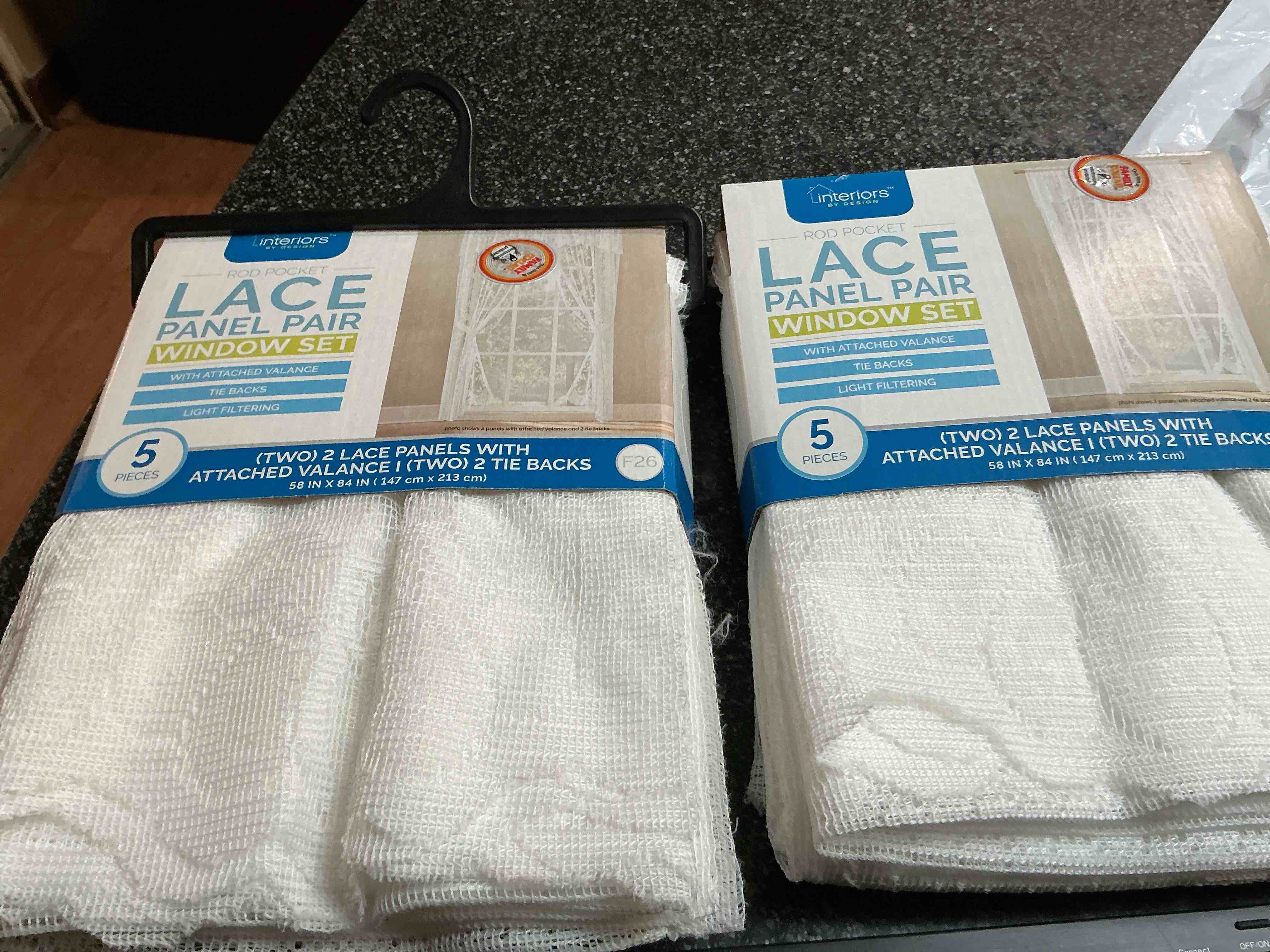 Condition photo showing New/Like New for Interiors By Design Lace Panel Pair Window Set 5 Pieces  In A Pack 