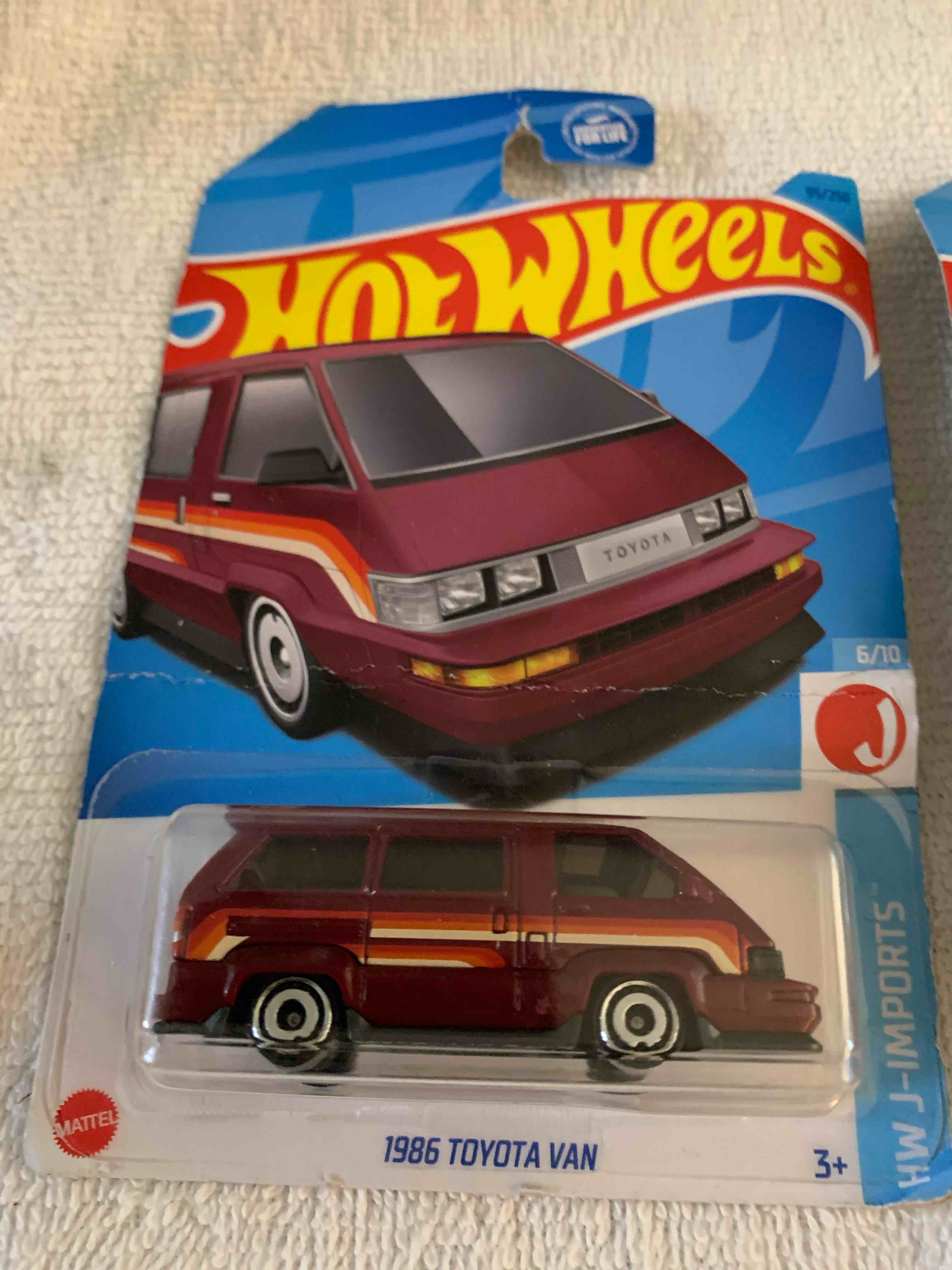 Condition photo showing New/Like New for Two Hot Wheels Cards