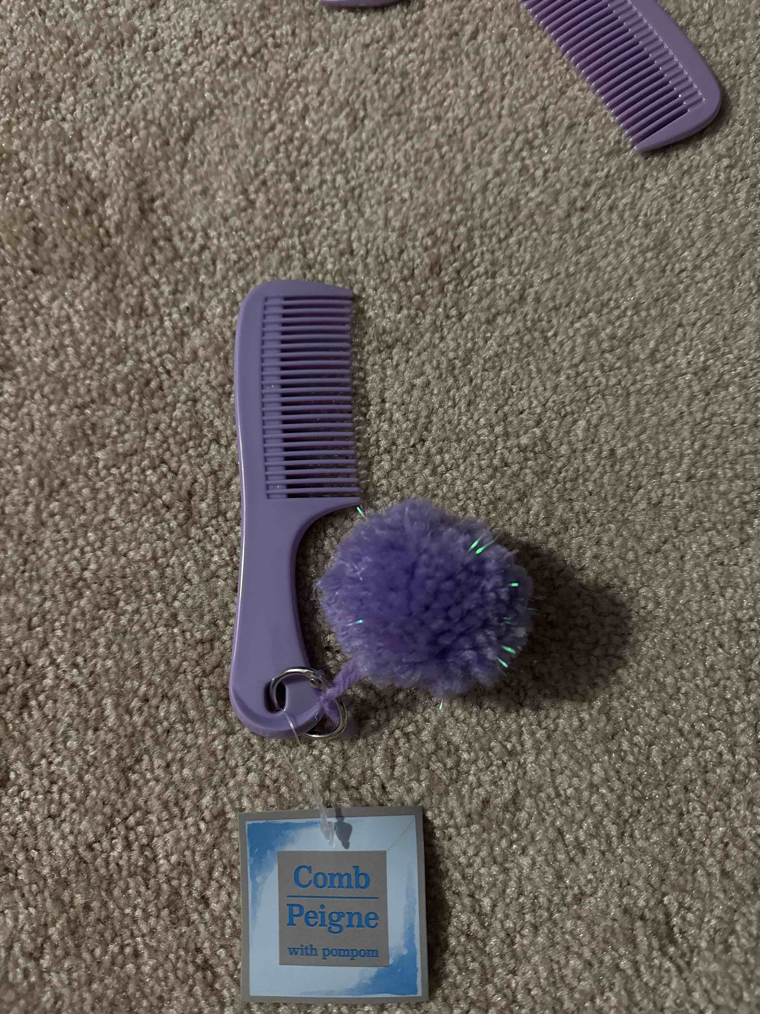 comb with pompom