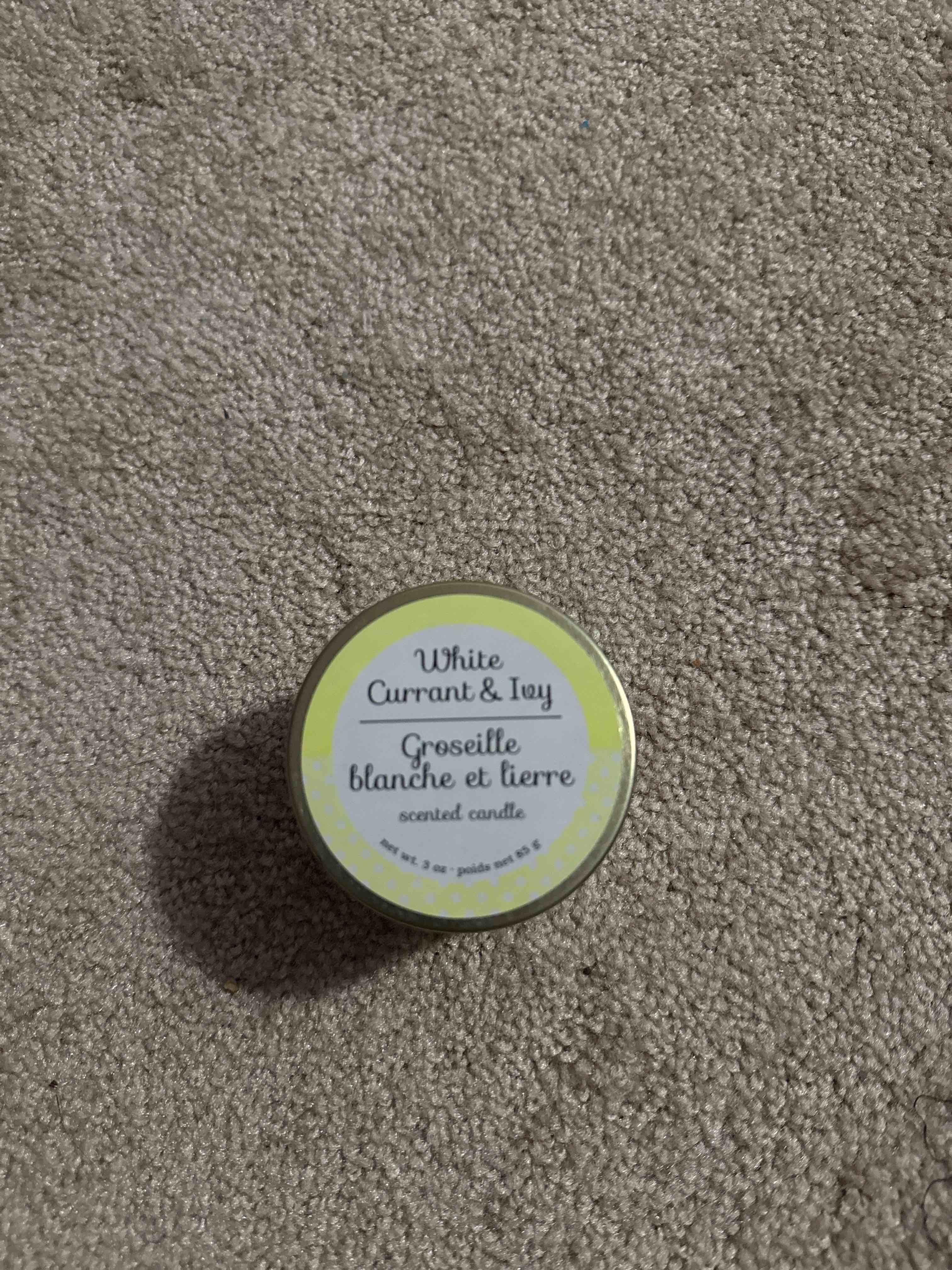 Condition photo showing New/Like New for white current and ivy scented candle