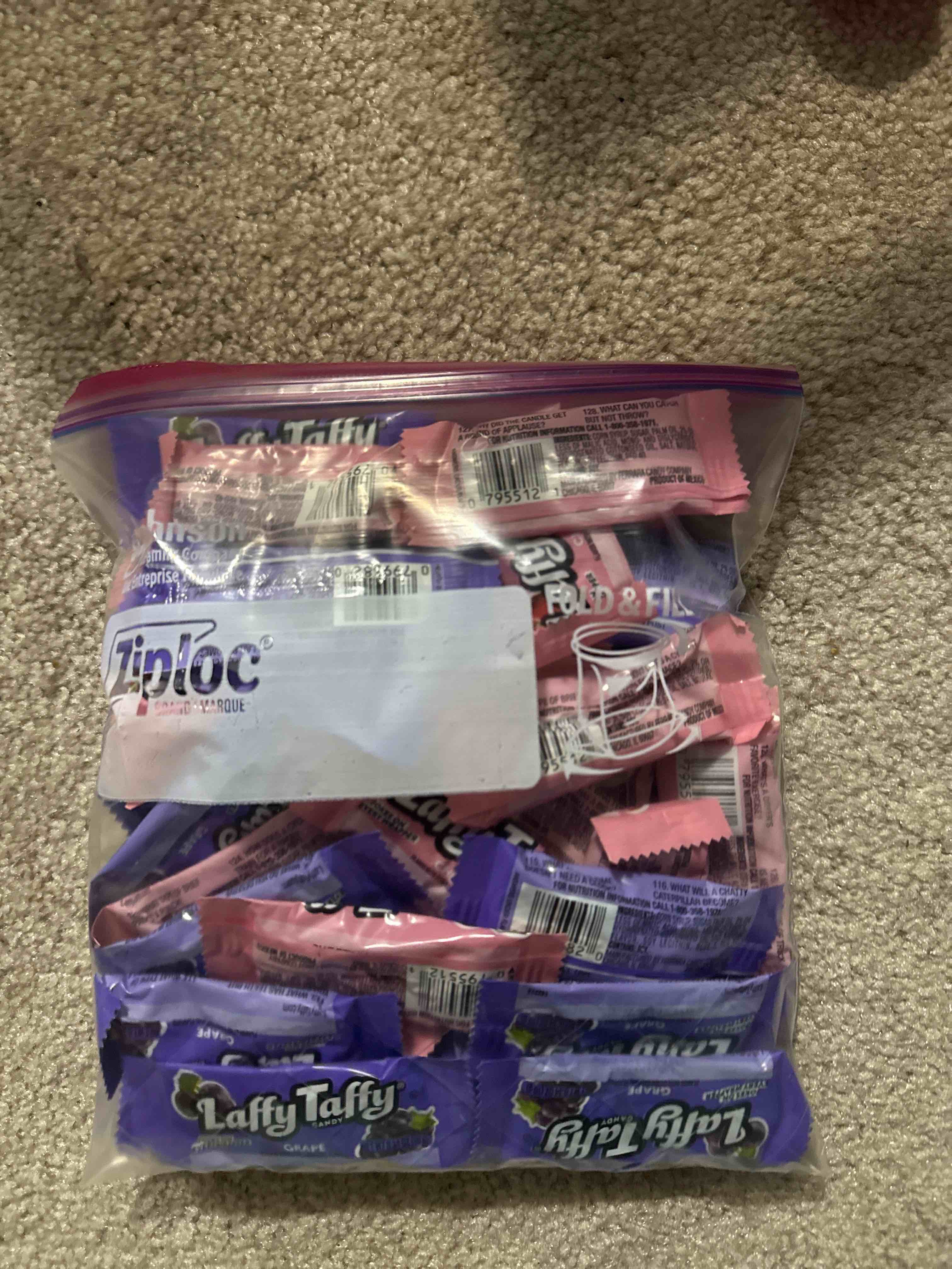 Condition photo showing New/Like New for one pound mixed cherry and grape Laffy taffy 