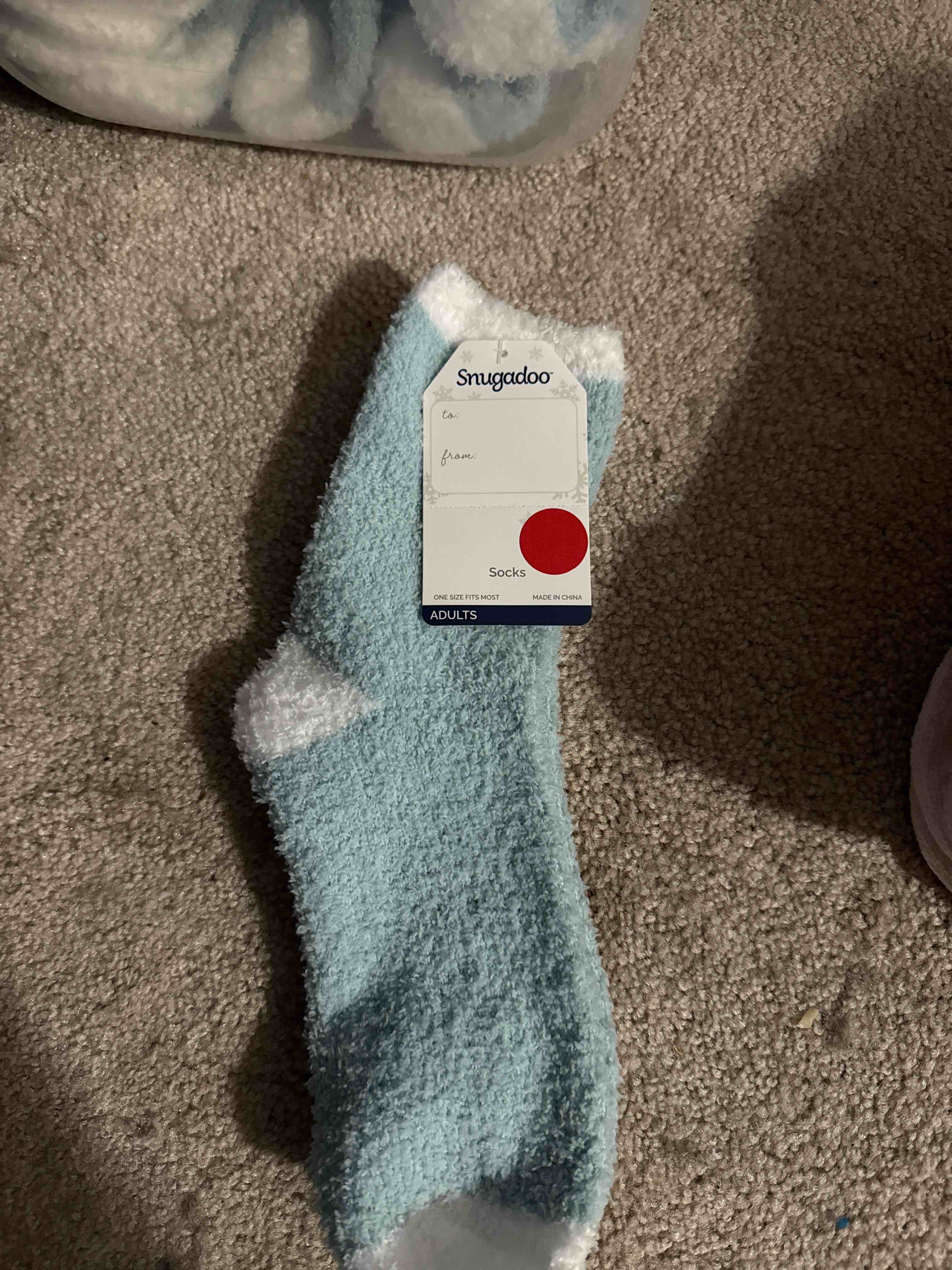 Condition photo showing New/Like New for light blue adult socks one size fits most 