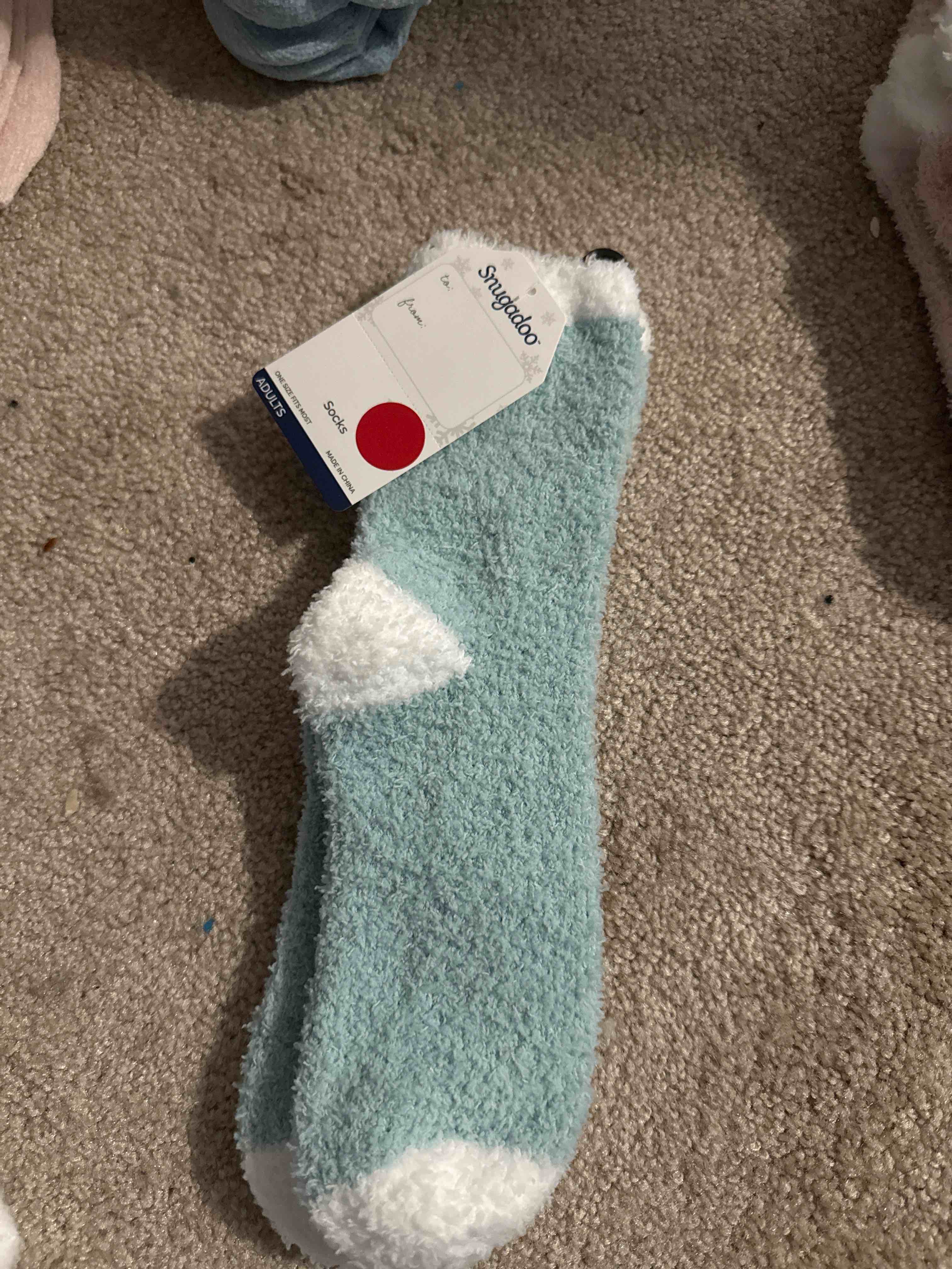 Condition photo showing New/Like New for light blue adult socks one size fits most
