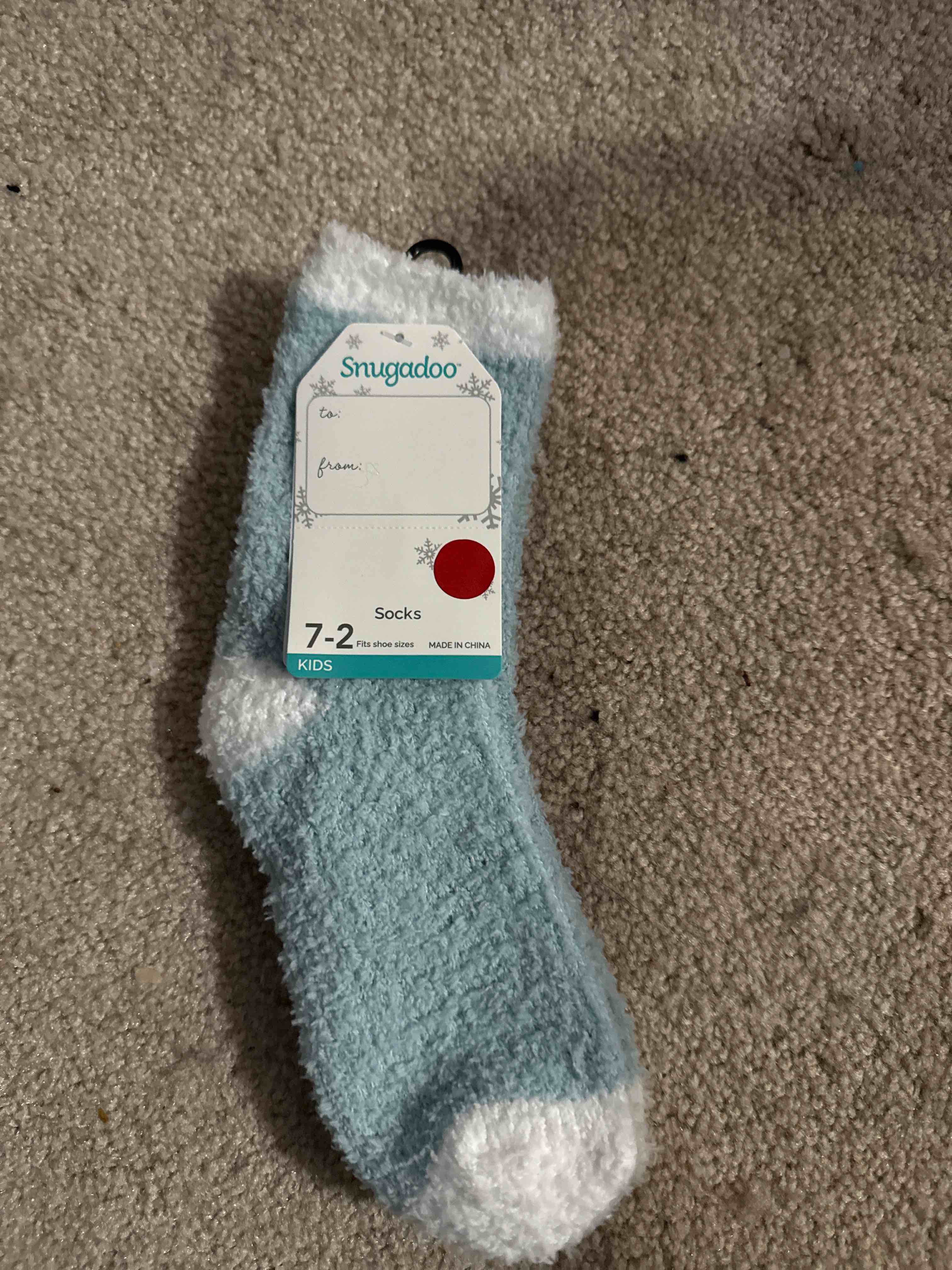Condition photo showing New/Like New for grey kids sock size 7-2