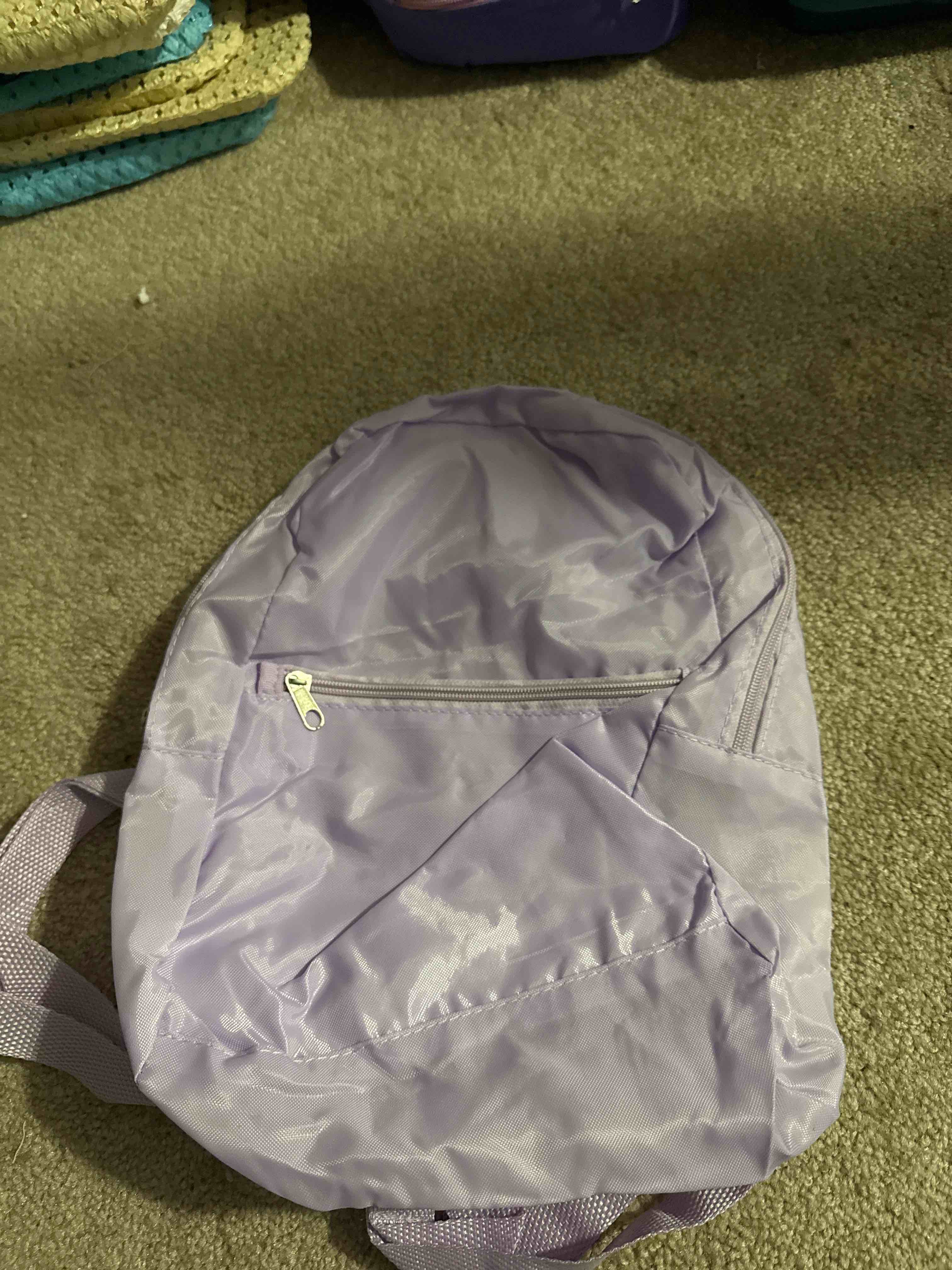Condition photo showing New/Like New for purple backpack