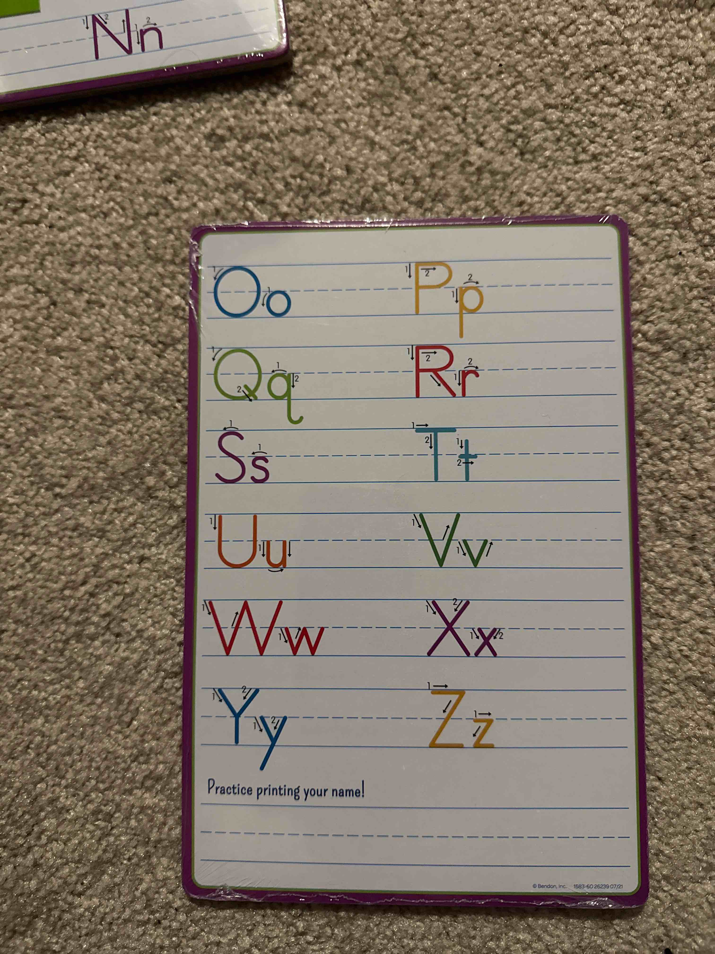 Condition photo showing New/Like New for the alphabet wipe clean board