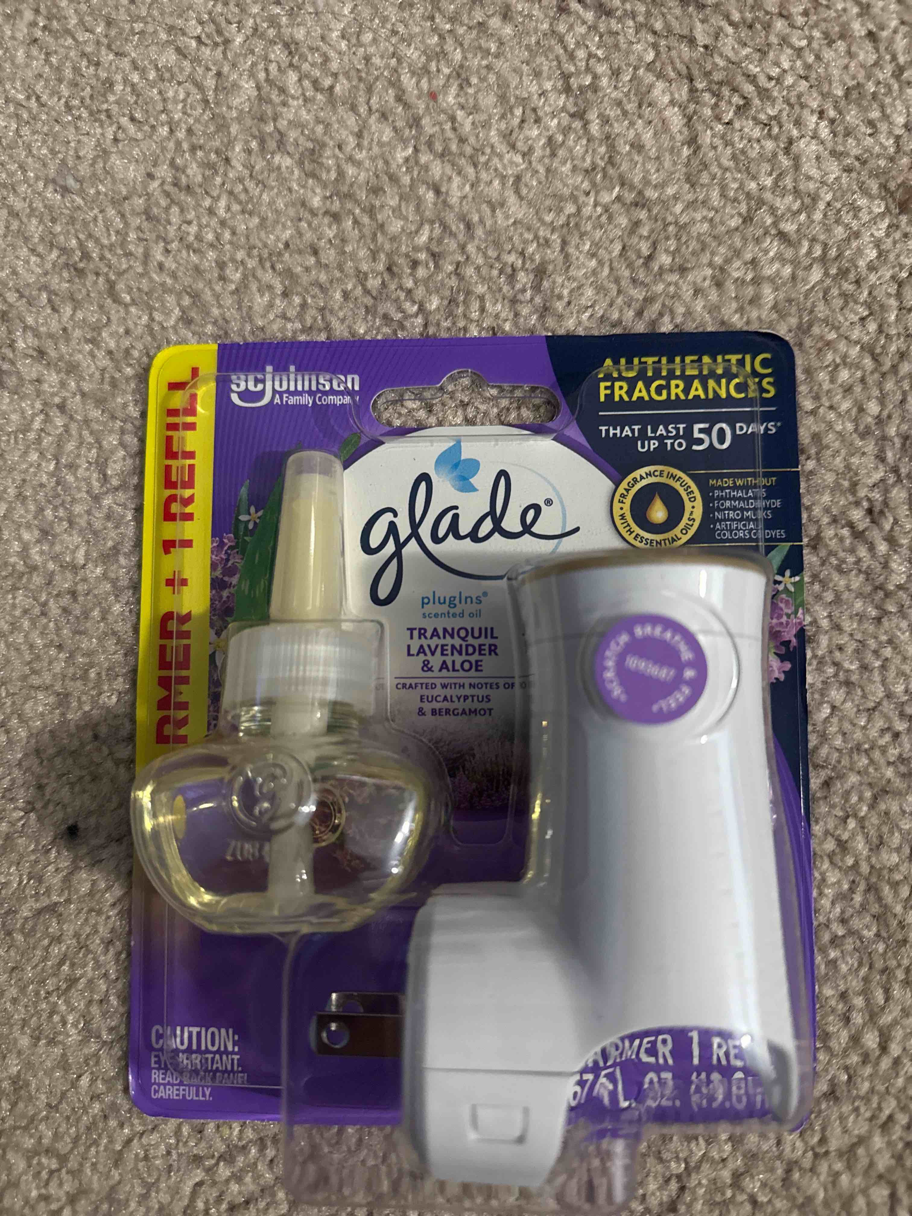 Condition photo showing New/Like New for glade warmer plus 1 refill tranquil lavender and aloe