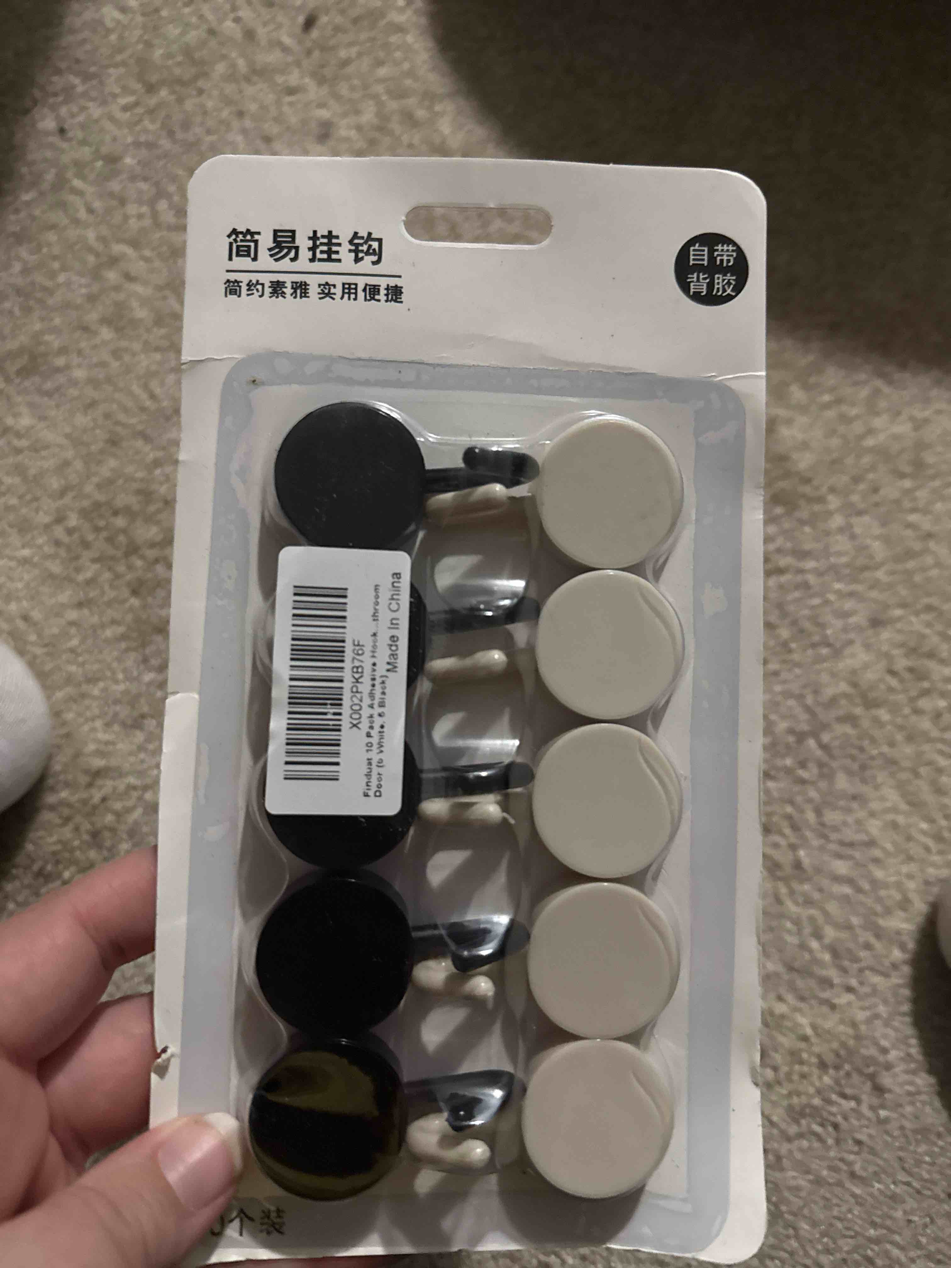 Condition photo showing New/Like New for 10 Count adhesive wall hooks