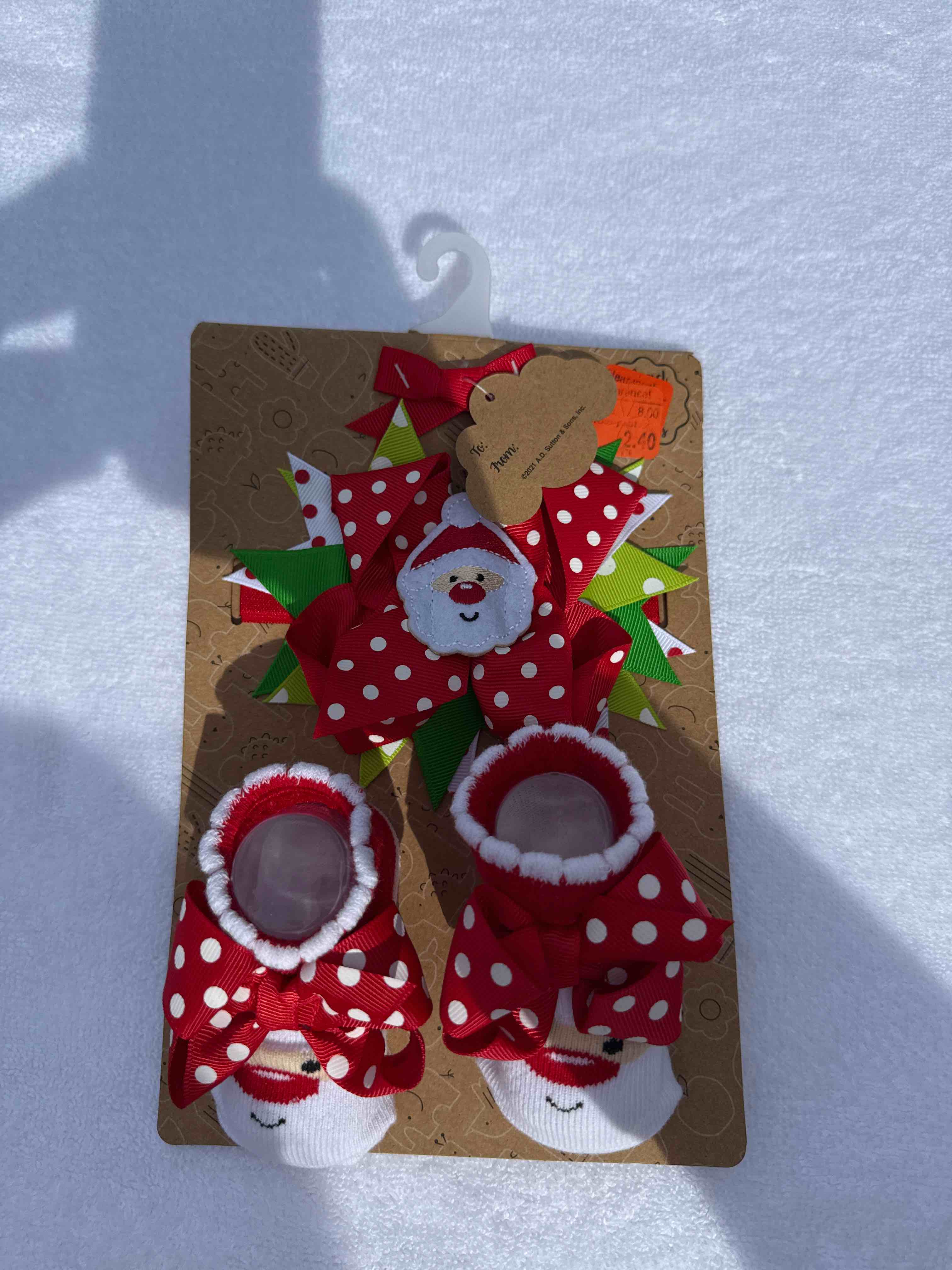 Baby Christmas booties and bows
