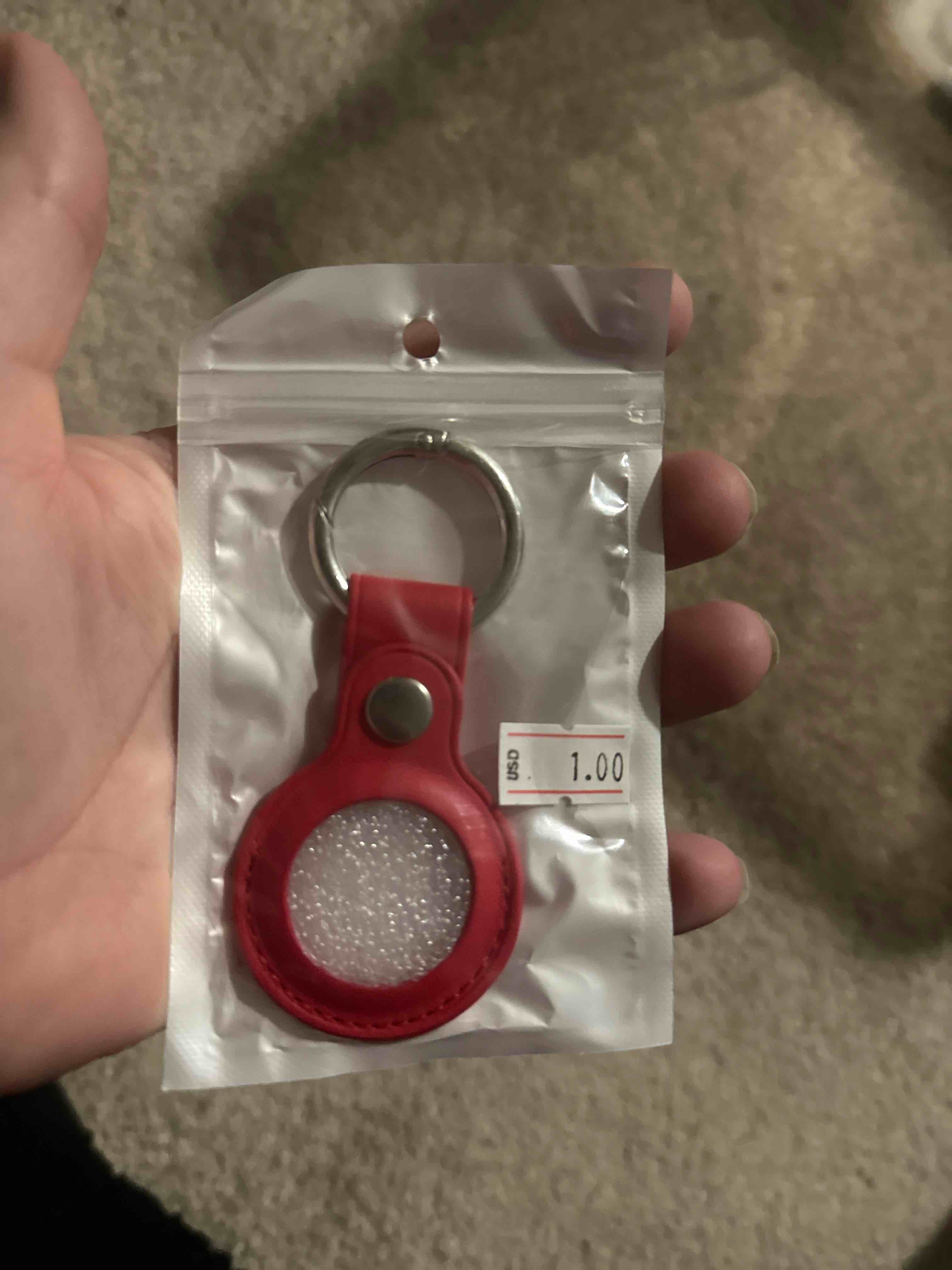 Condition photo showing New/Like New for red AirTag holder 