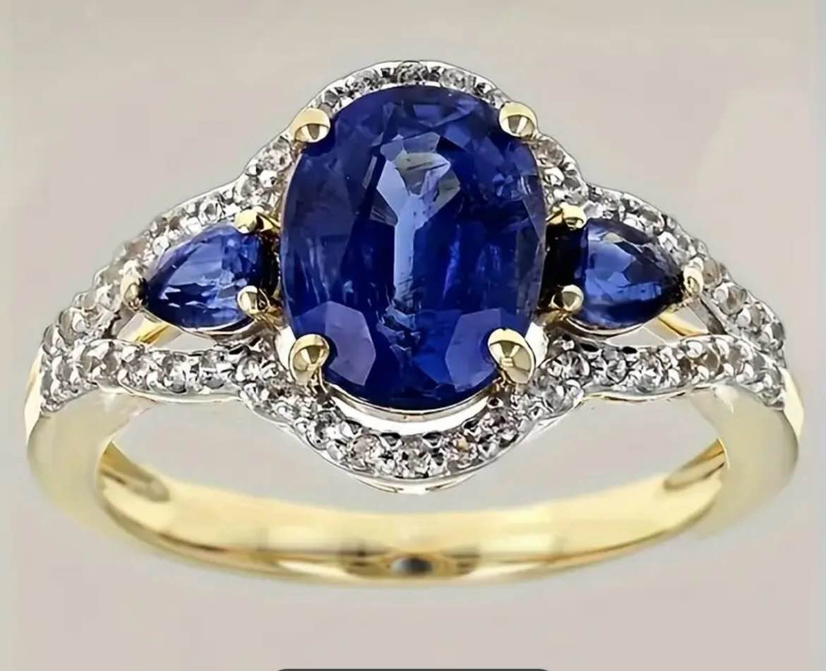 BEAUTIFUL GOLD RING WITH BLUE STONES AND ACCENTED BAND (Size 9)