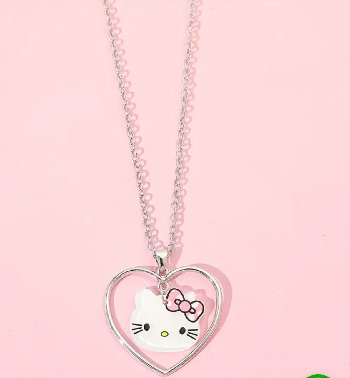 Adorable Hello Kitty necklace featuring a 925 silver plated heart frame