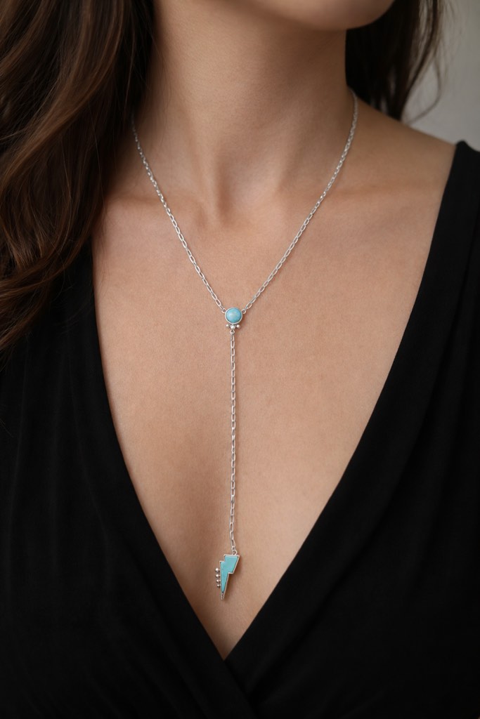 Sleek and modern, this 925 silver plated  Y-style necklace features a vibrant turquoise stone 