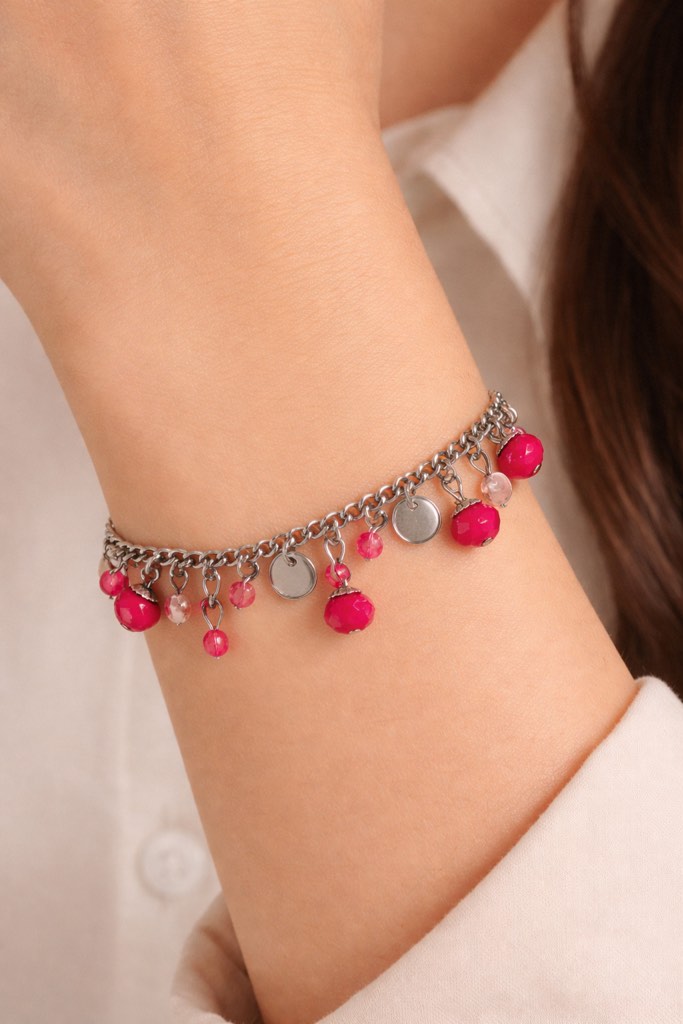 Delicate 925 silver plated charm bracelet featuring vibrant pink beads and dangling accents,