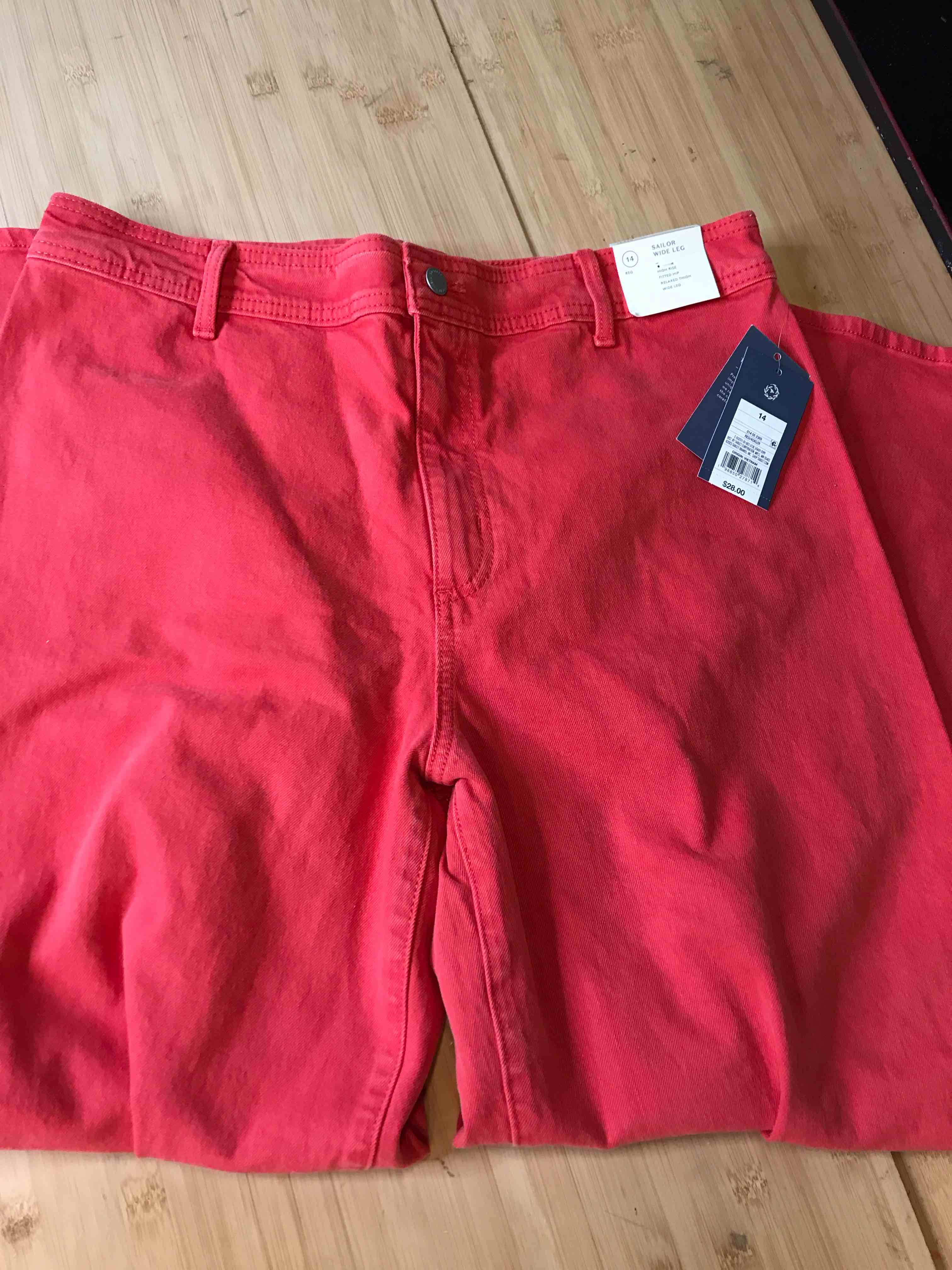 Condition photo showing New/Like New for Women's High-Rise Sailor Wide Leg Ankle Jeans - Universal Thread™ Red 14