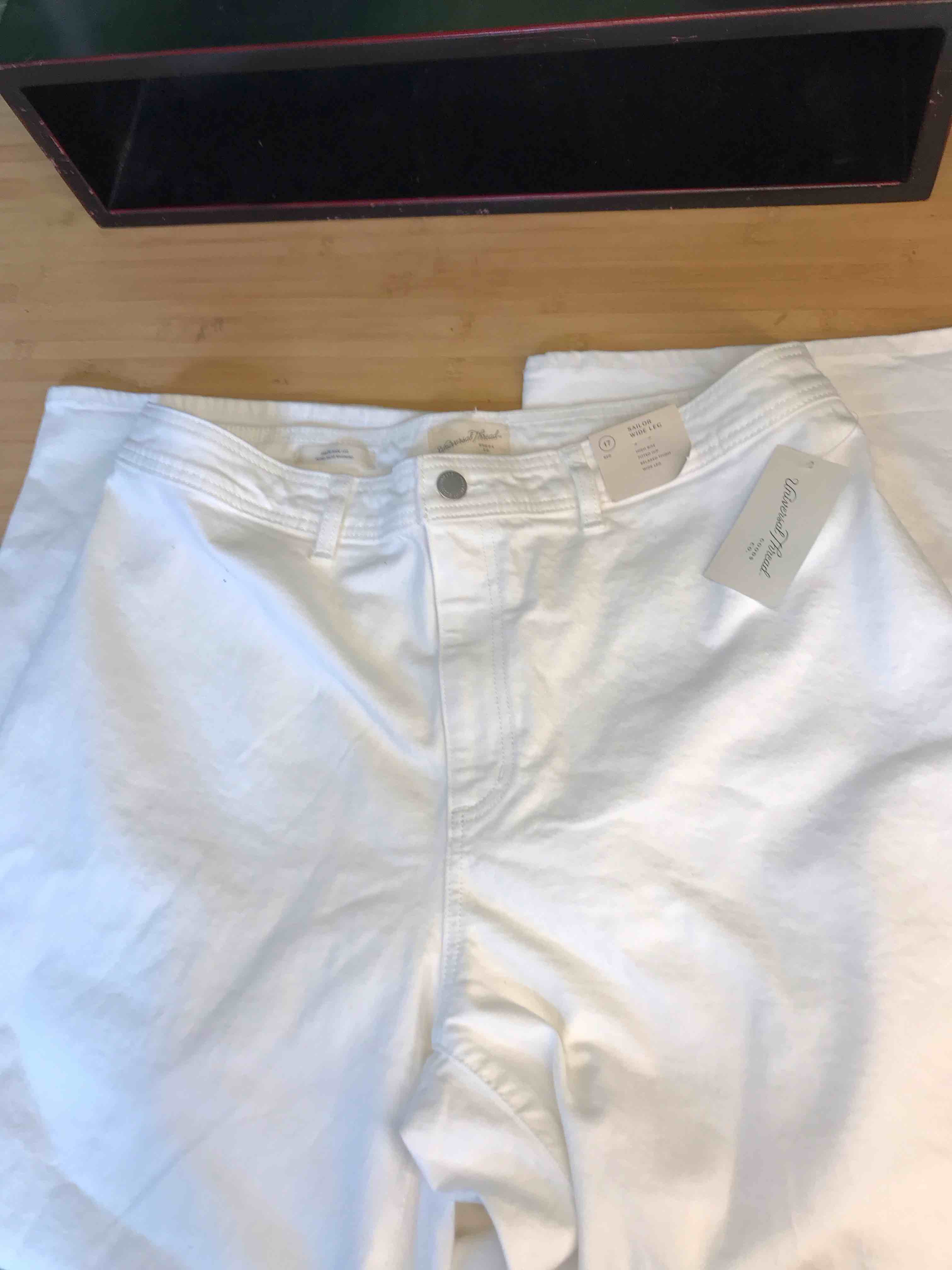 Condition photo showing New/Like New for Women's High-Rise Sailor Wide Leg Ankle Jeans - Universal Thread™ White 17: Cotton Denim, Relaxed Fit