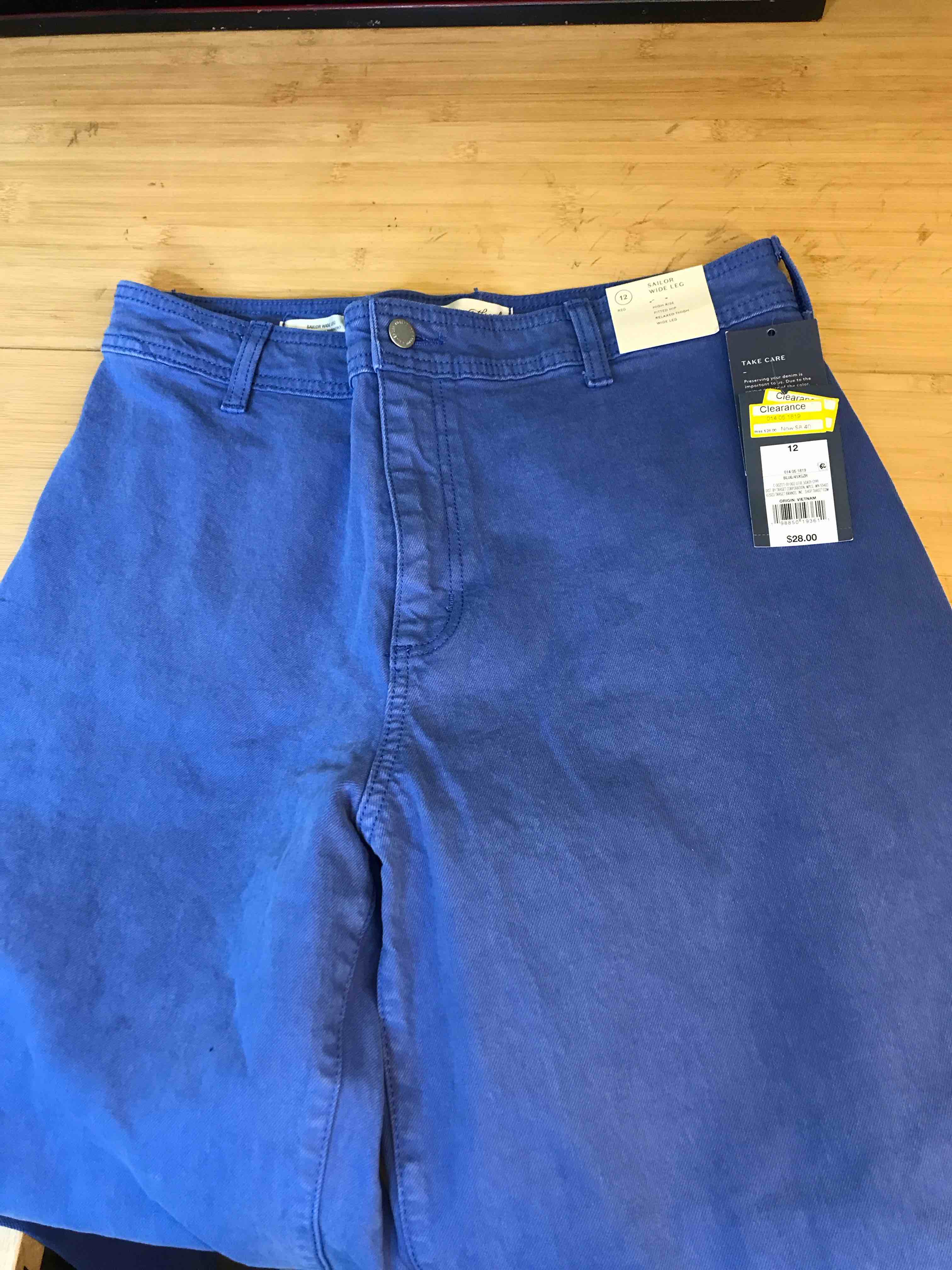 Condition photo showing New/Like New for Women's High-Rise Sailor Wide Leg Ankle Jeans - Universal Thread™ Blue 12: Relaxed Fit, Denim, 29" Inseam, Fly Button Closure