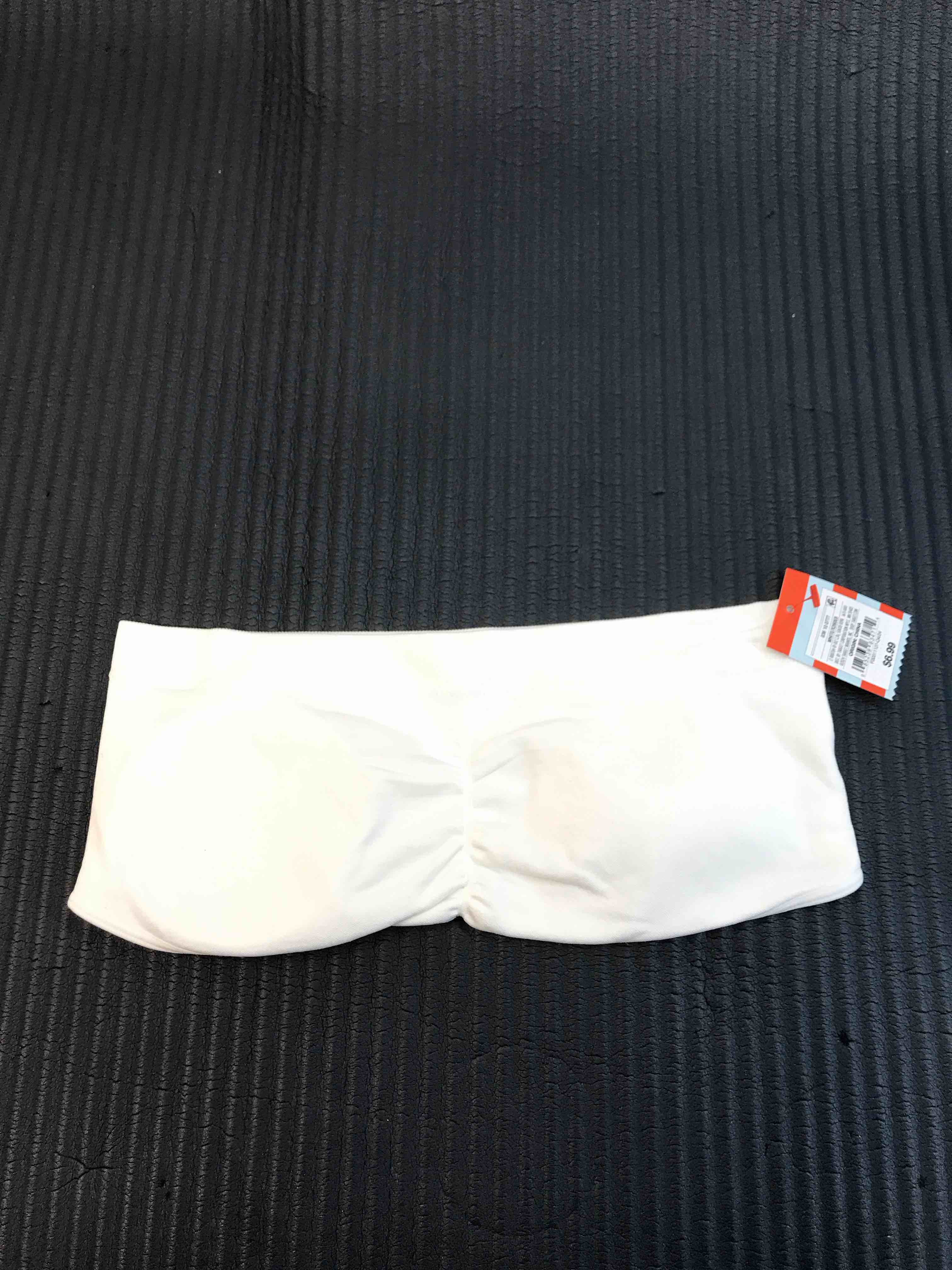 Condition photo showing New/Like New for Girls' Strapless Bandeau Bra - Cat & Jack™ White L: Seamless Knit, Removable Padding