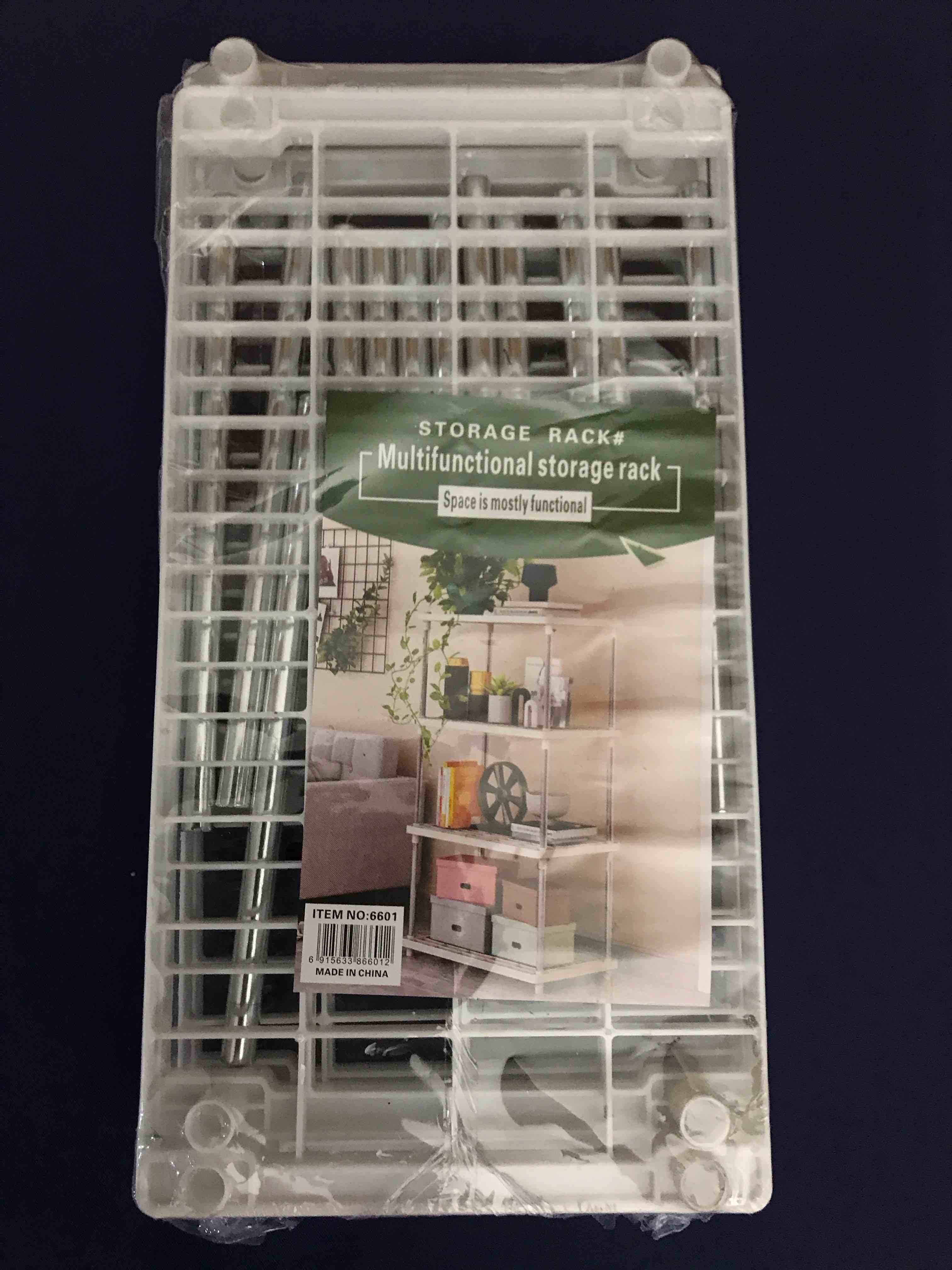 Condition photo showing New/Like New for 4 shelf multifunctional storage rack chrome white