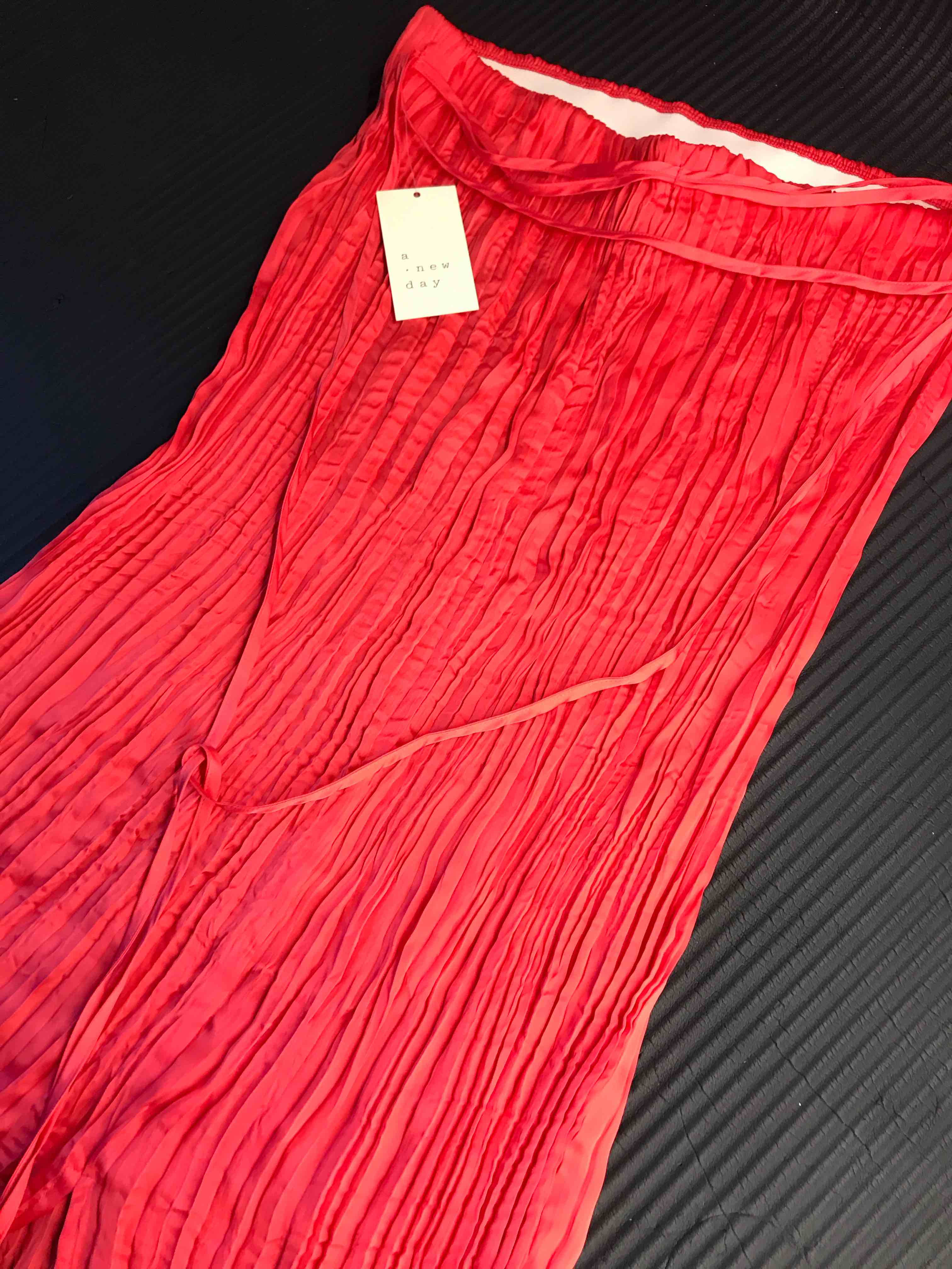 Condition photo showing New/Like New for Women s Textured Crinkle Satin Midi Skirt - A New Day™ Pink M