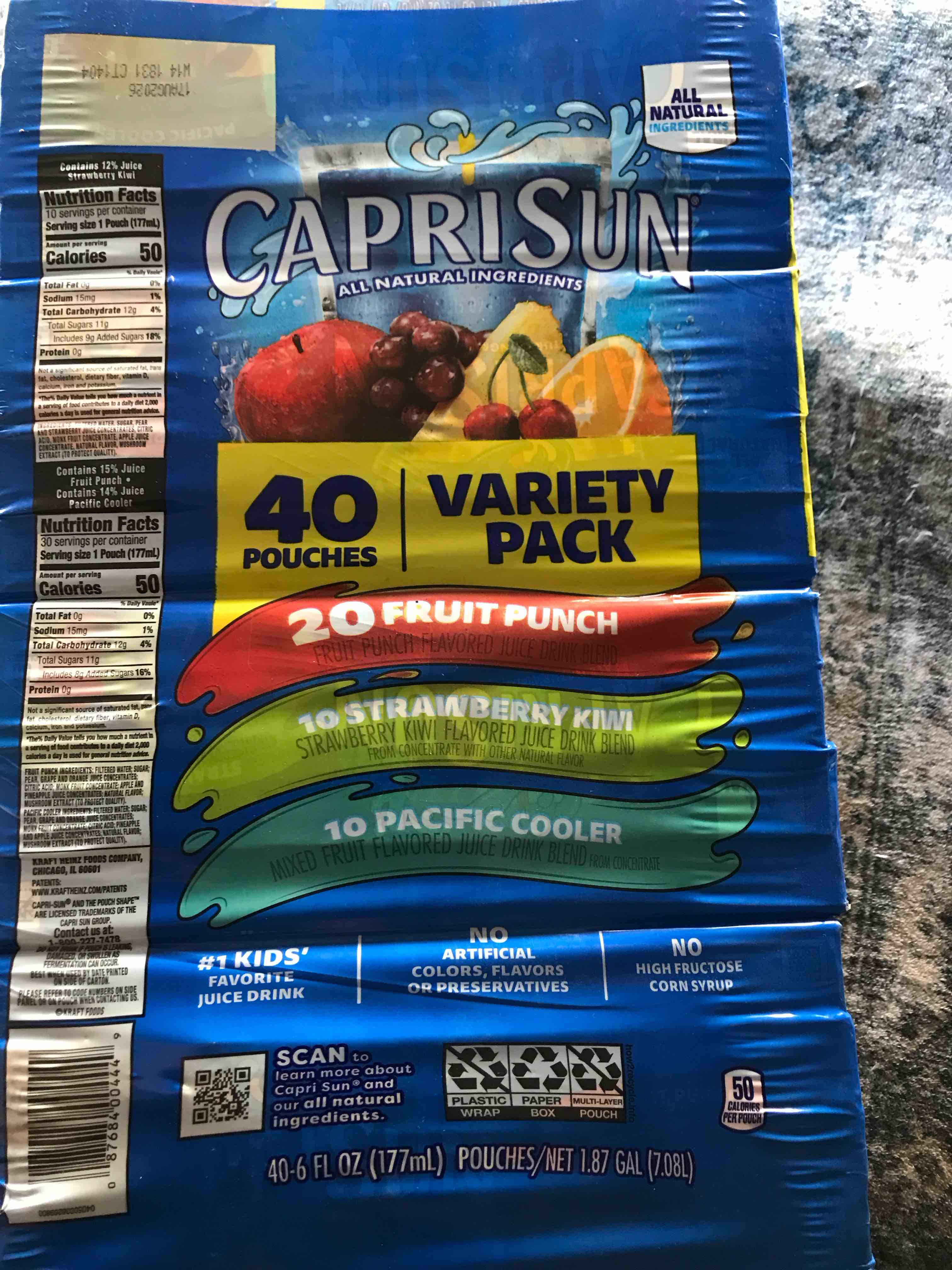 Condition photo showing New/Like New for Capri Sun Fruit Punch  Strawberry Kiwi and Pacific Cooler Flavored with other natural flavor Juice Drink Blend Variety Pack  40 ct Box  6 fl oz Pouches