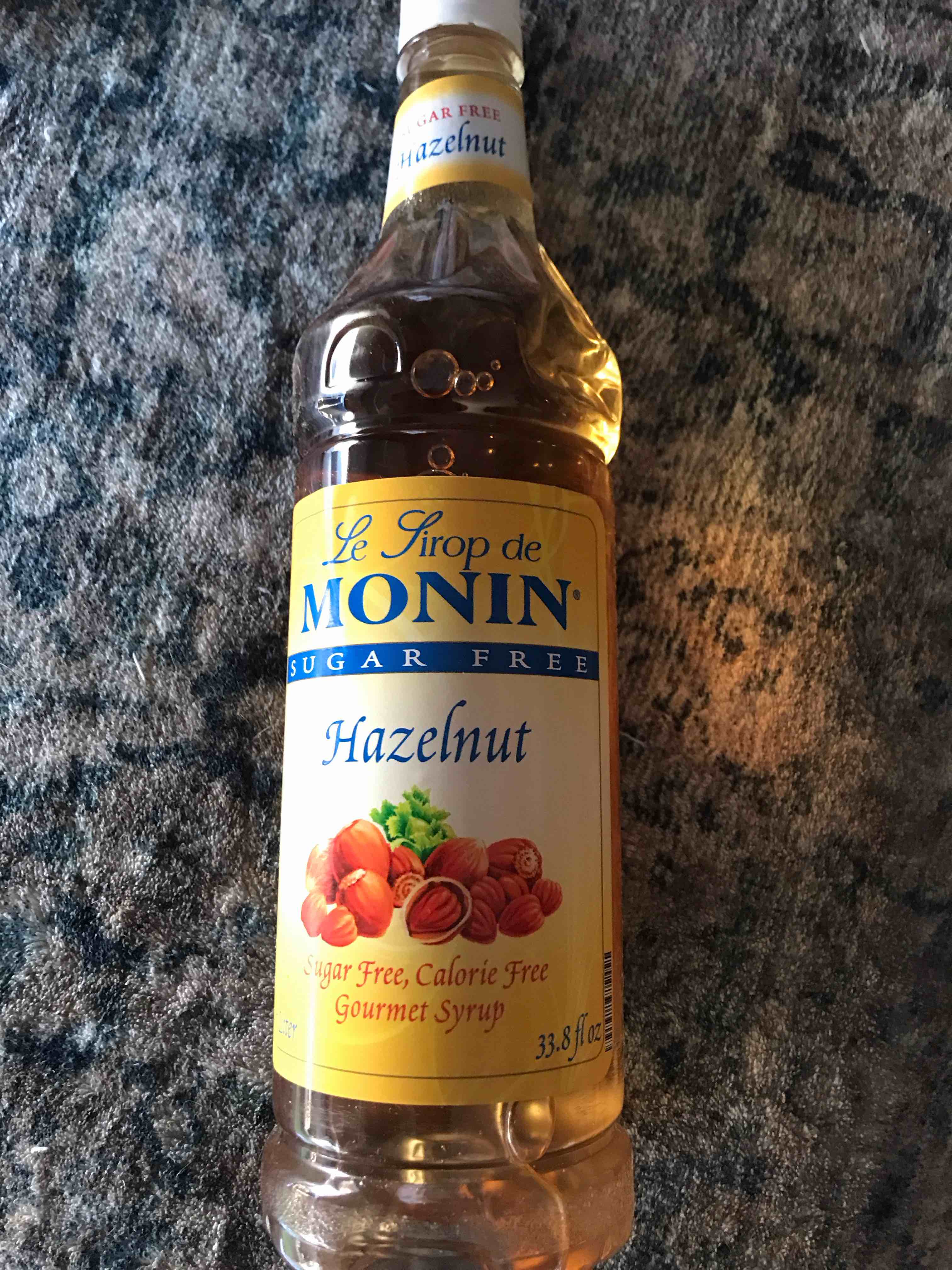 Condition photo showing New/Like New for Monin - Sugar Free Hazelnut Syrup, Nutty Taste of Caramelized Hazelnut, Natural Flavors, Great for Mochas, Lattes, Smoothies, Shakes, and Cocktails, Non-GMO, Gluten-Free (1 Liter)