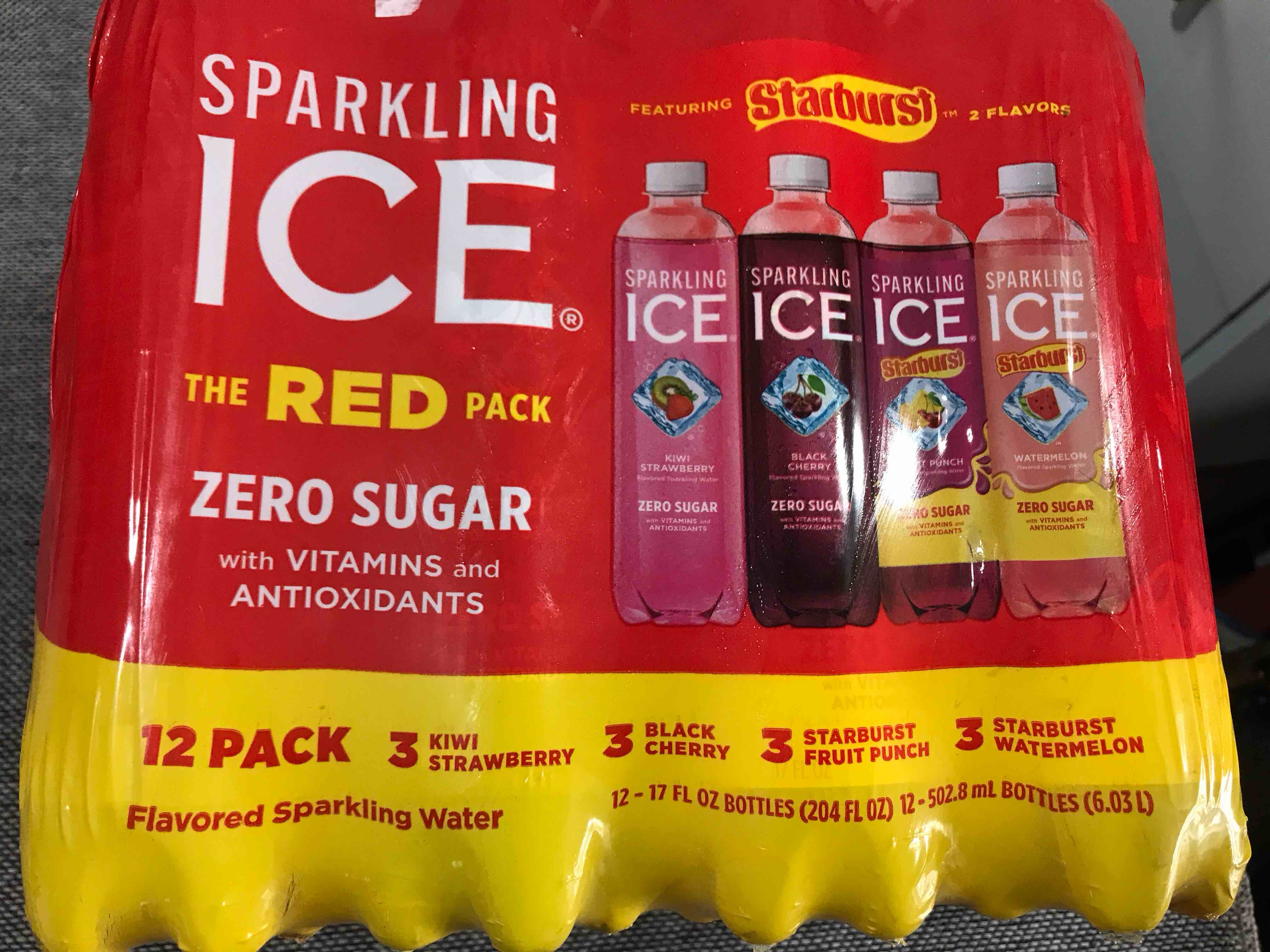 Condition photo showing Good Condition for Sparkling Ice STARBURST Red Variety Pack, Zero Sugar Flavored Sparkling Water, Vitamins & Antioxidants, 17 fl oz, 12 count (Kiwi Strawberry, Black Cherry, Starburst Fruit Punch, Starburst Watermelon) Red Pack 17 Fl Oz (Pack of 12)