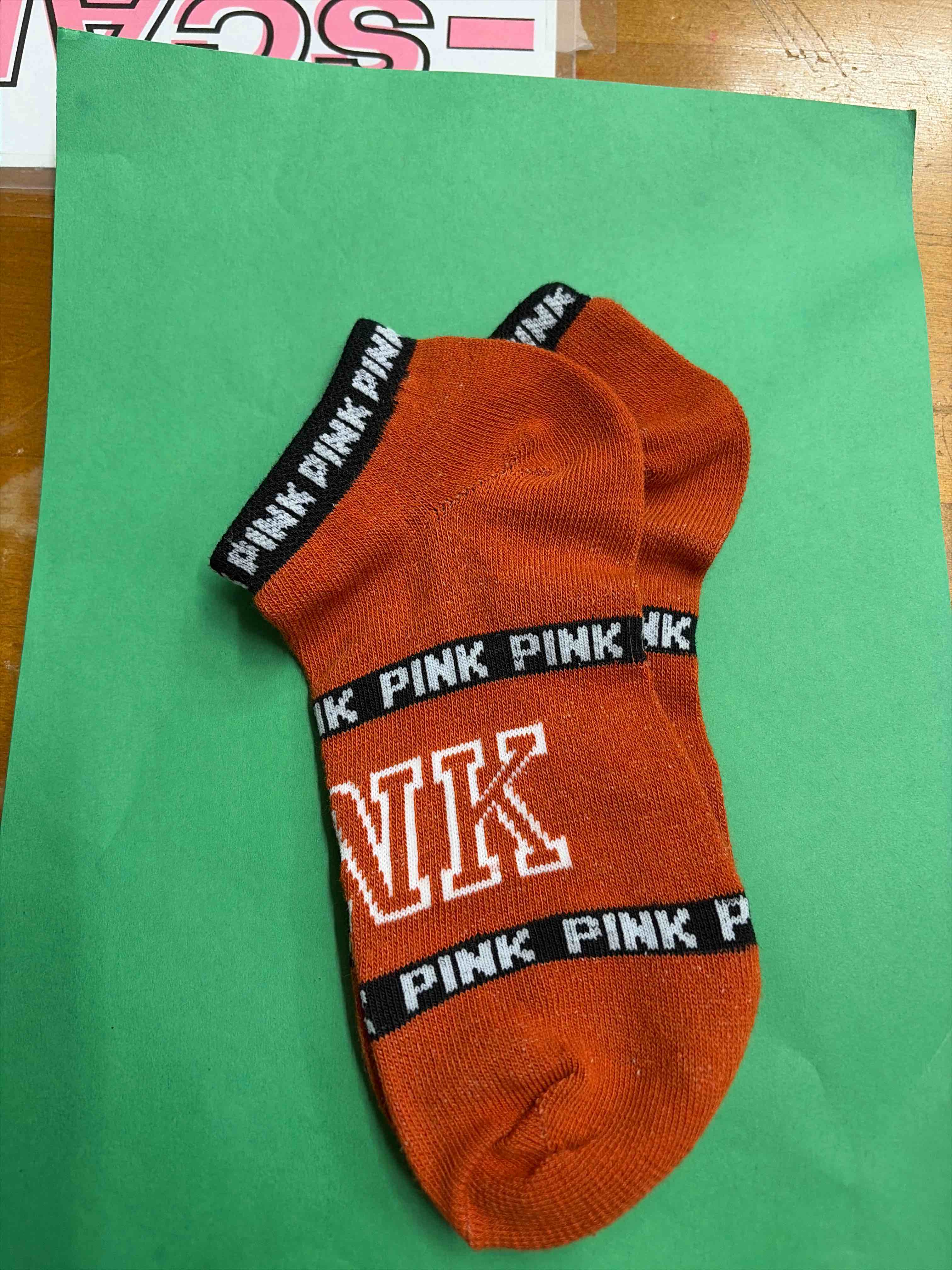pink socks (burnt orange color)
