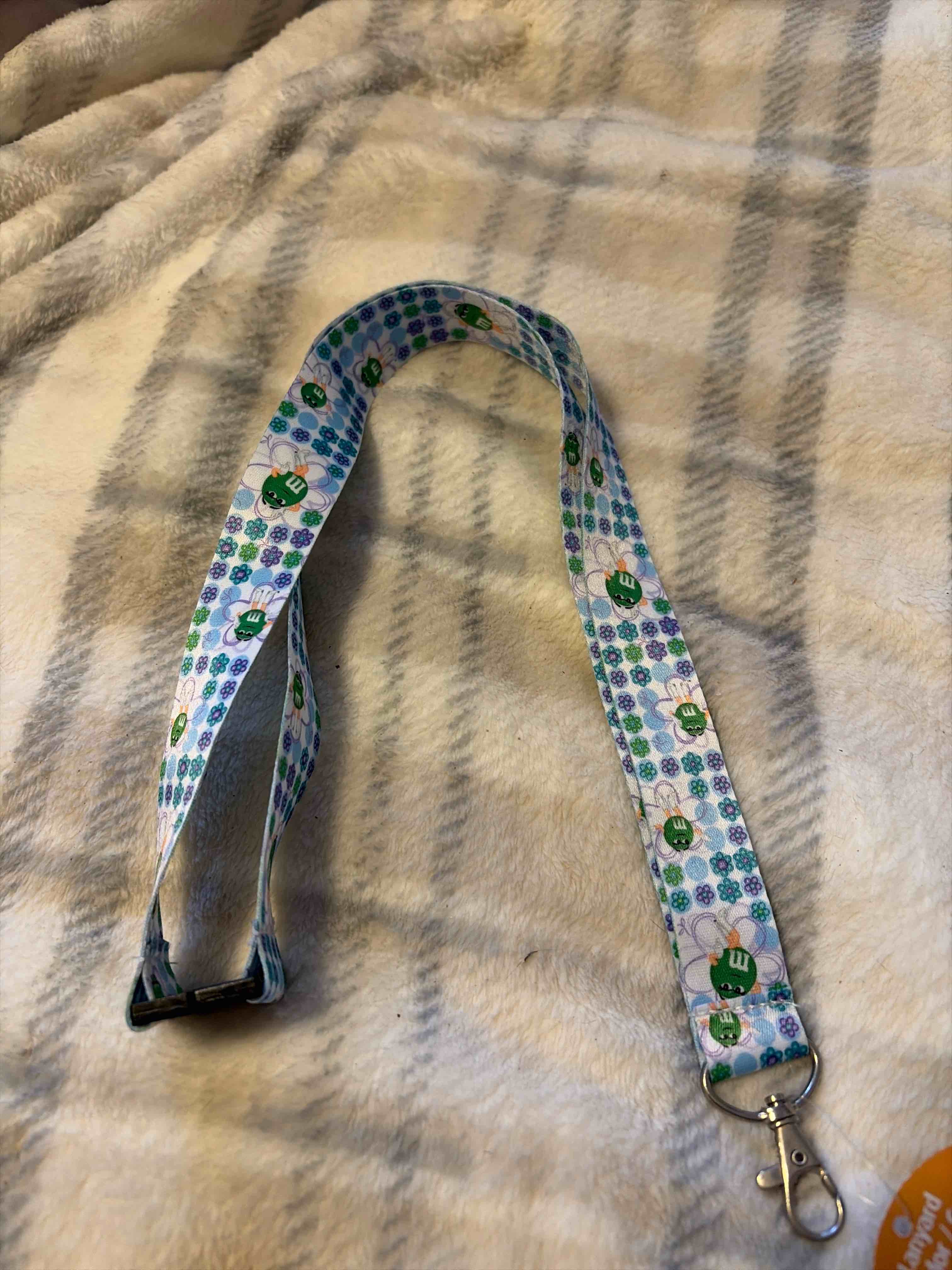 Condition photo showing New/Like New for M&m breakaway lanyard 