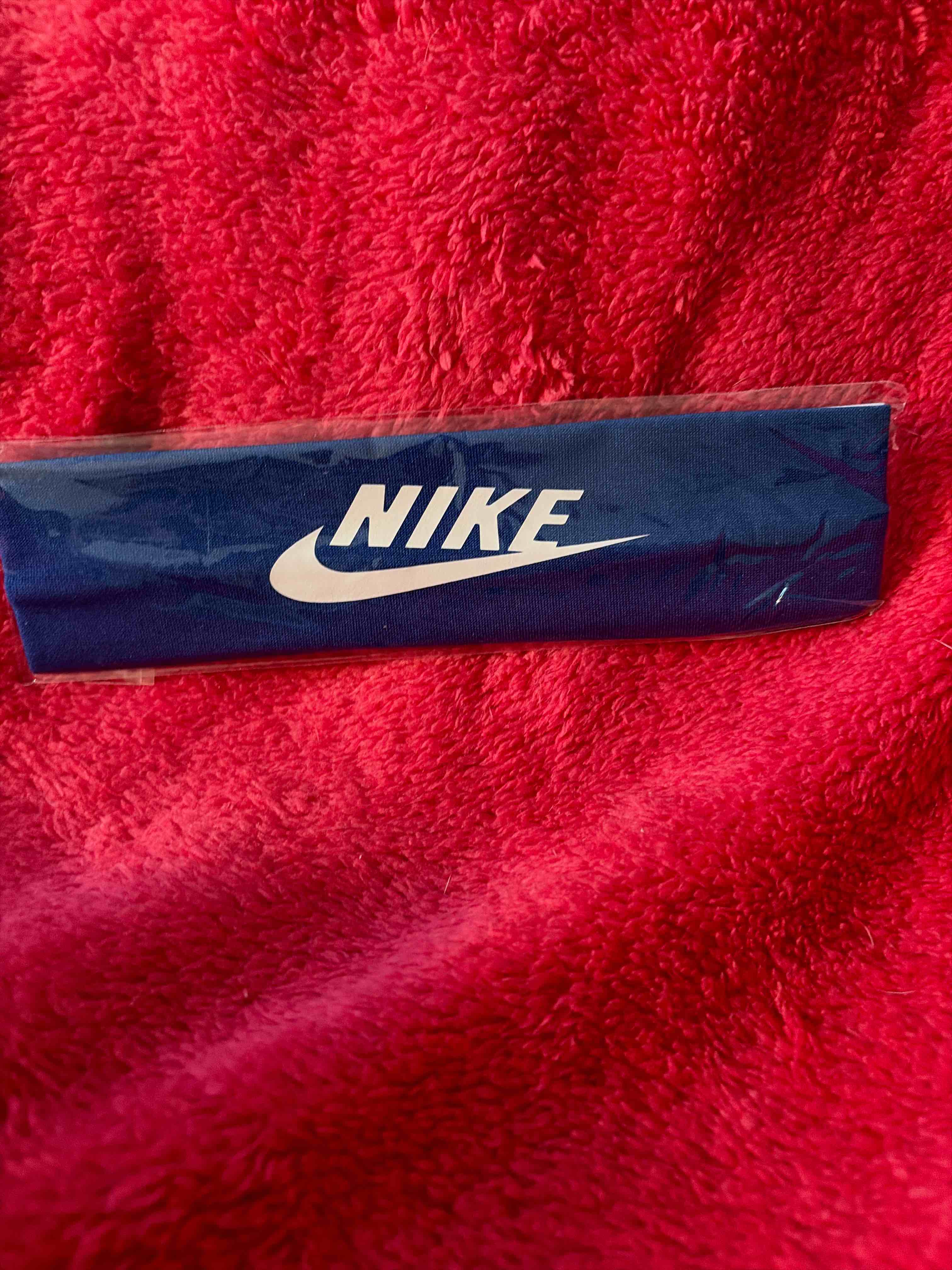 Condition photo showing New/Like New for Nike headband