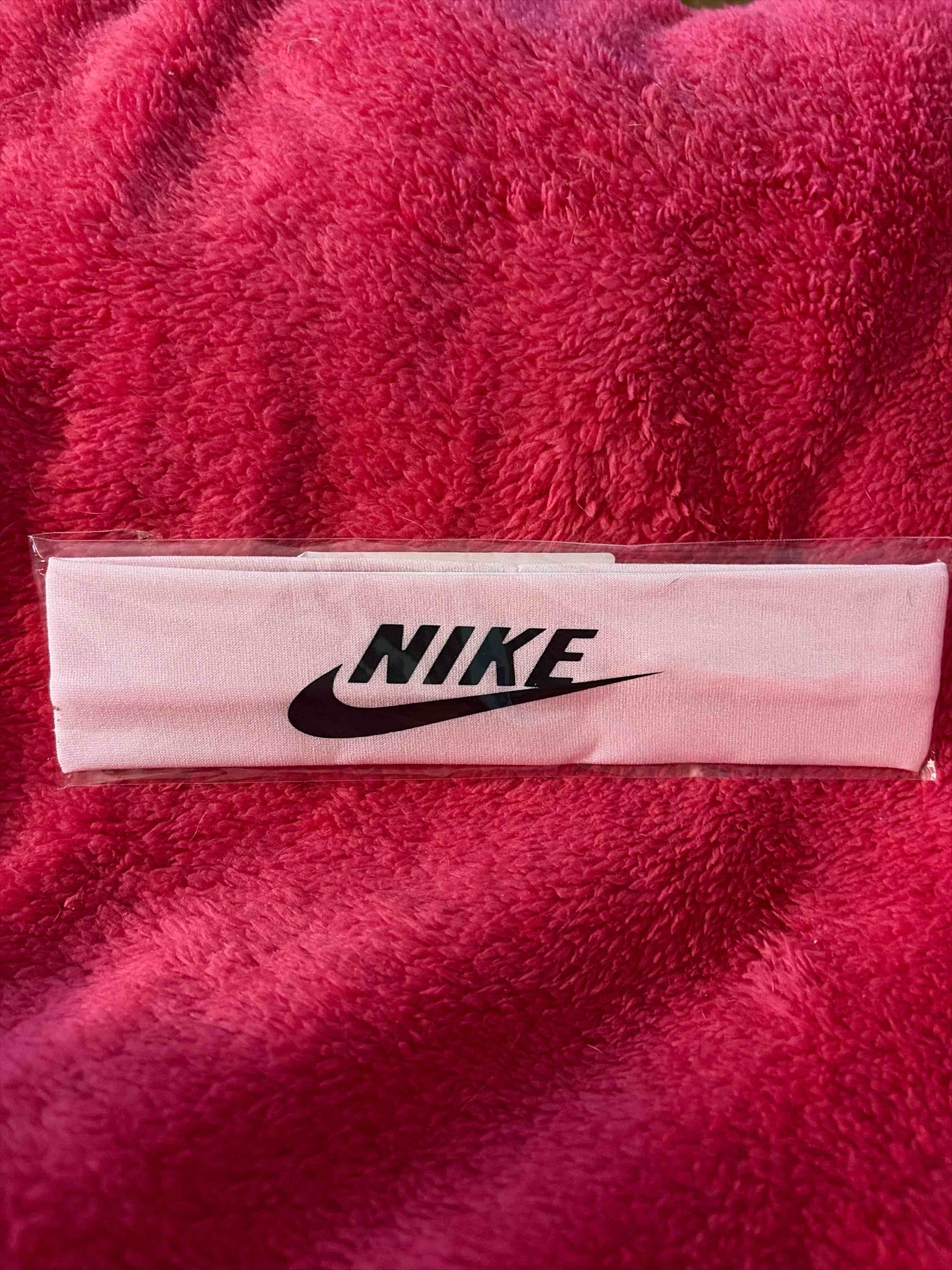 Condition photo showing New/Like New for Nike headband