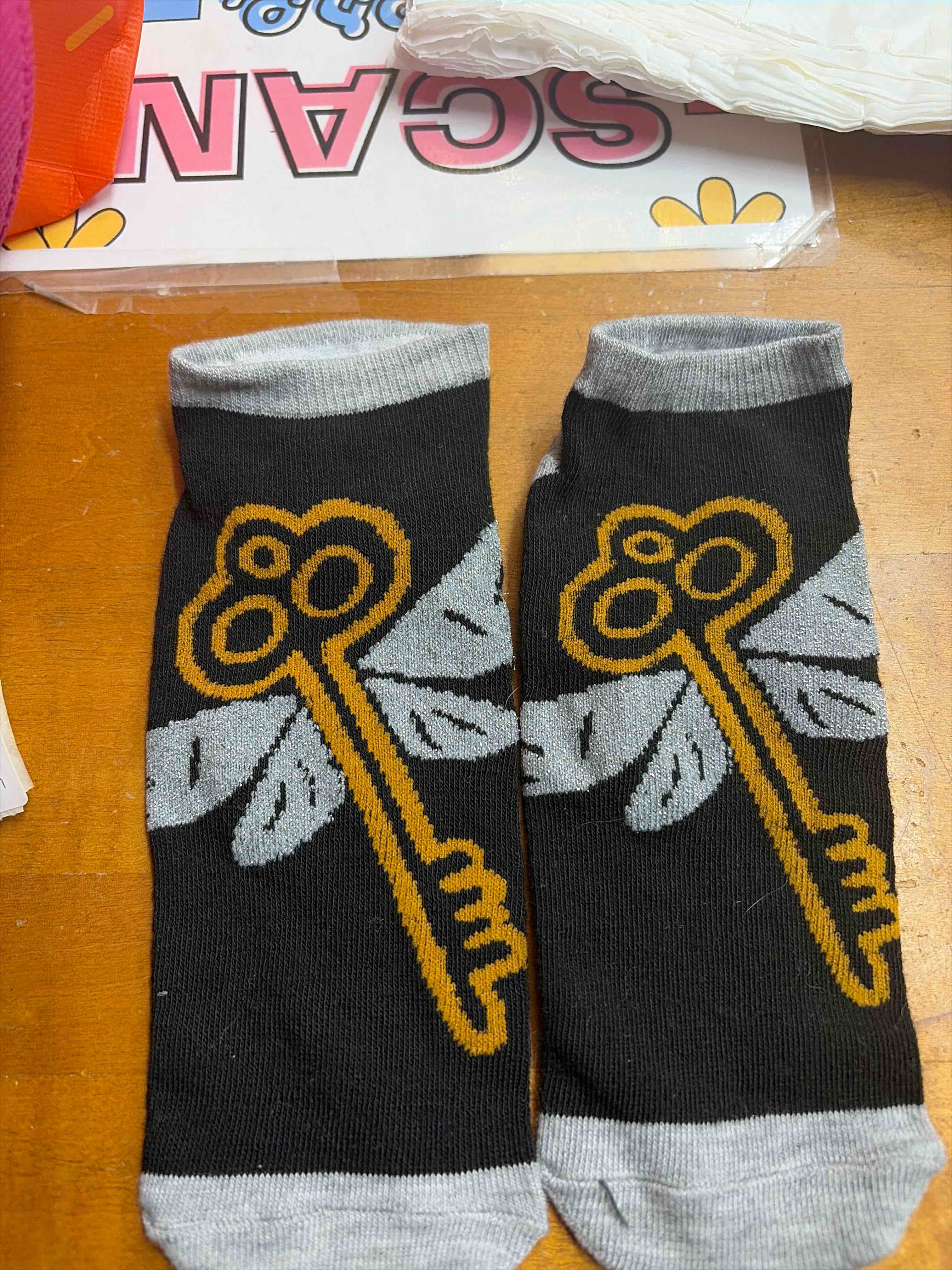 Condition photo showing New/Like New for Harry Potter socks adult size 