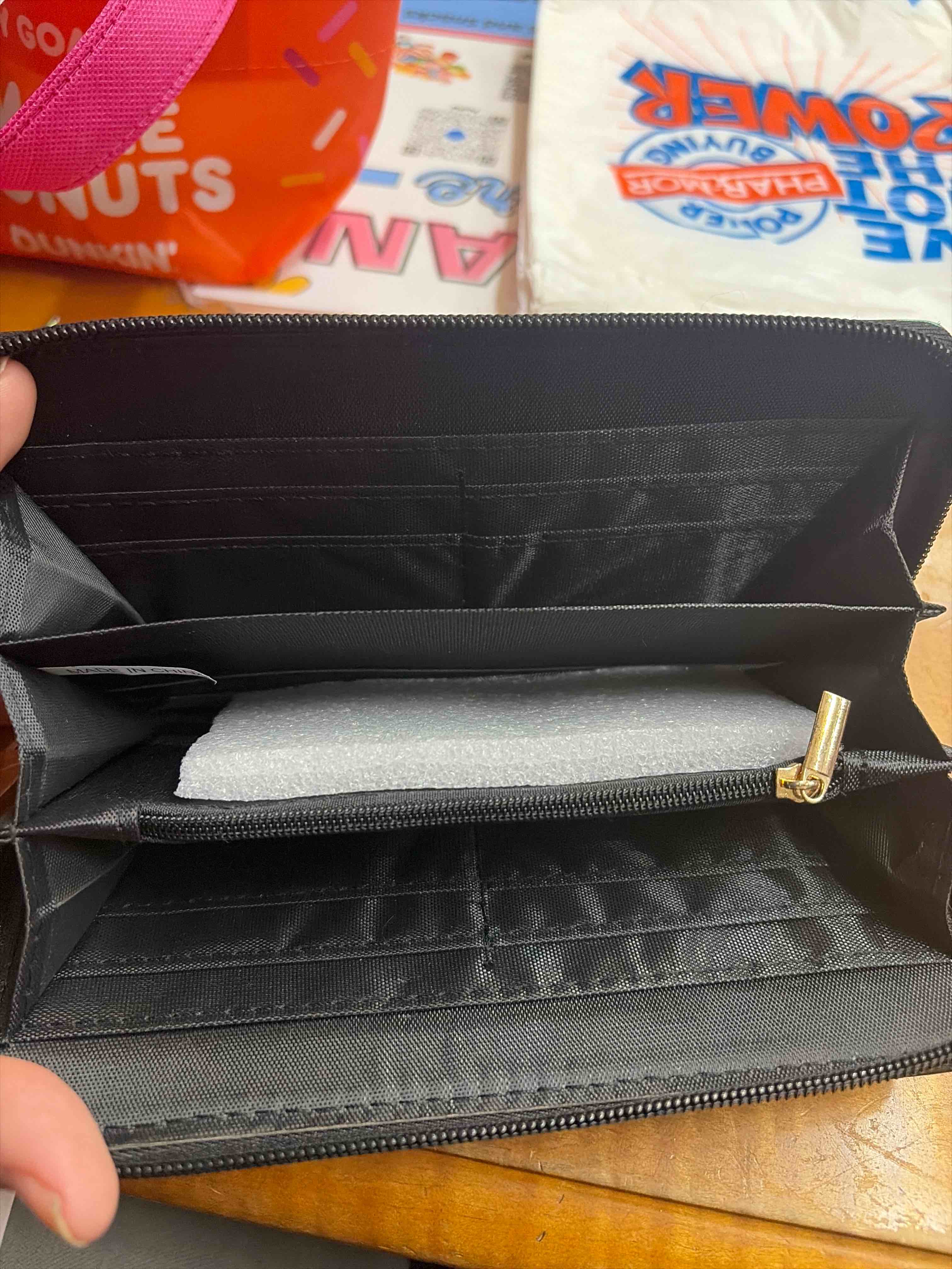 Condition photo showing New/Like New for flower wallet 