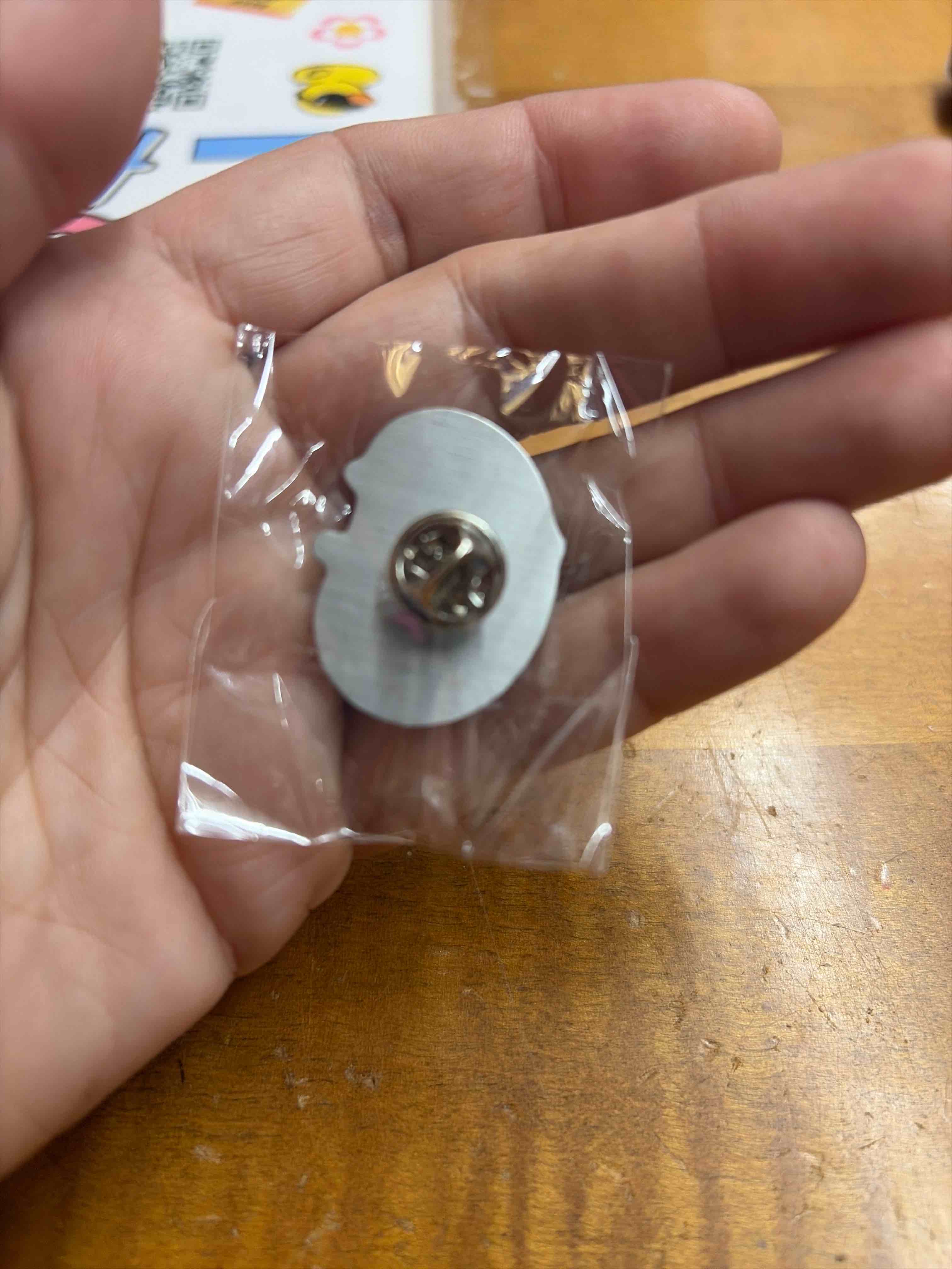 Condition photo showing New/Like New for Amazon collectors pin 