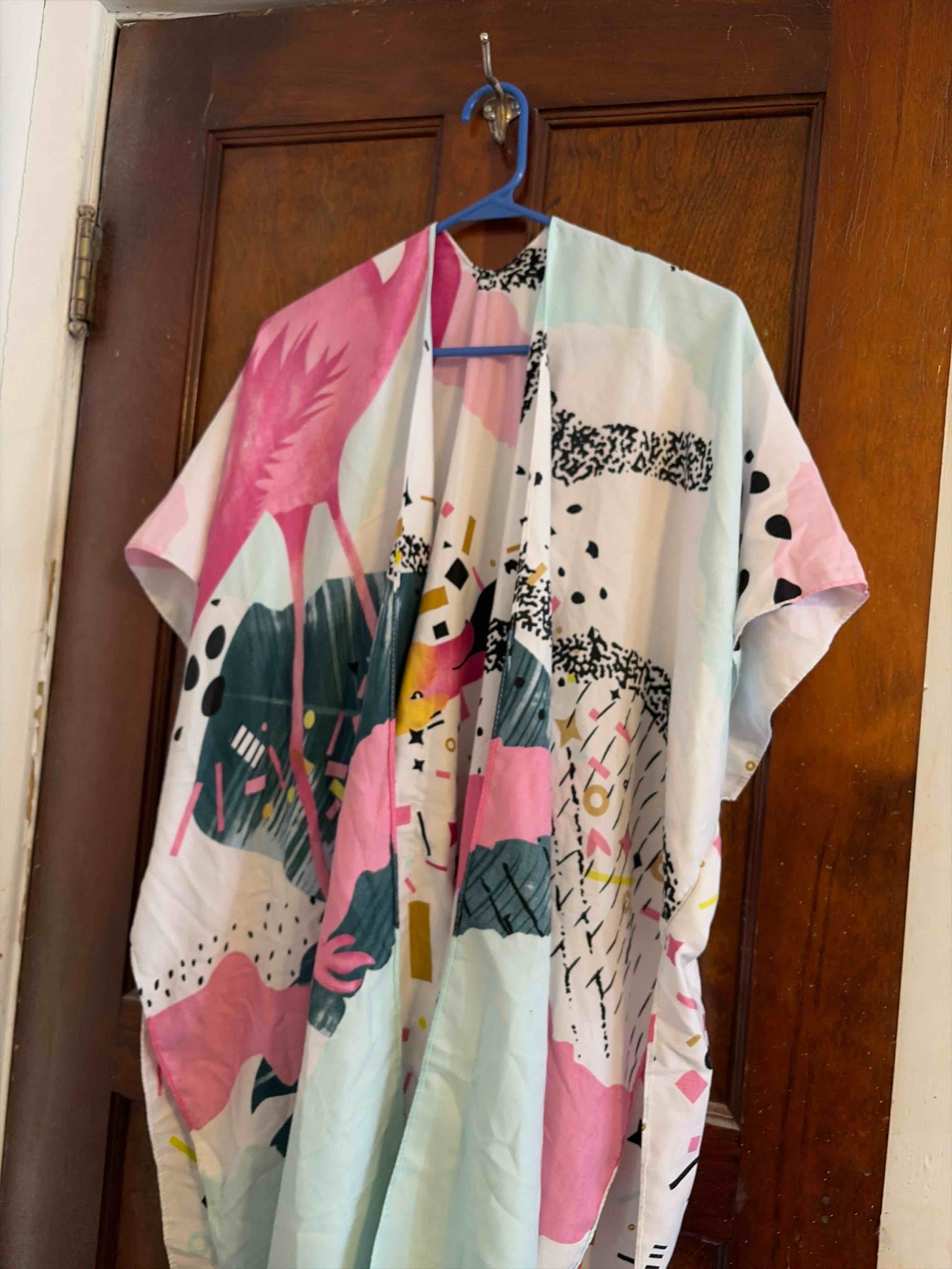 Condition photo showing Good Condition for open front shirt/bathing suit cover up/robe 